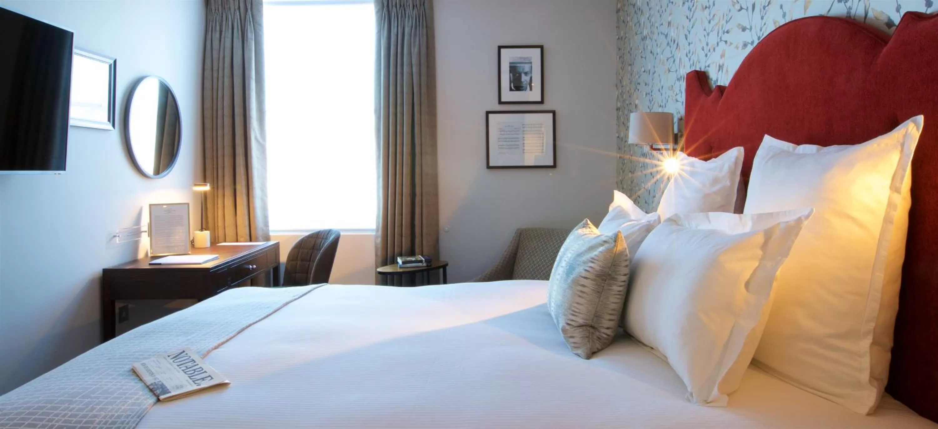 Bed in 54 Queen's Gate Hotel