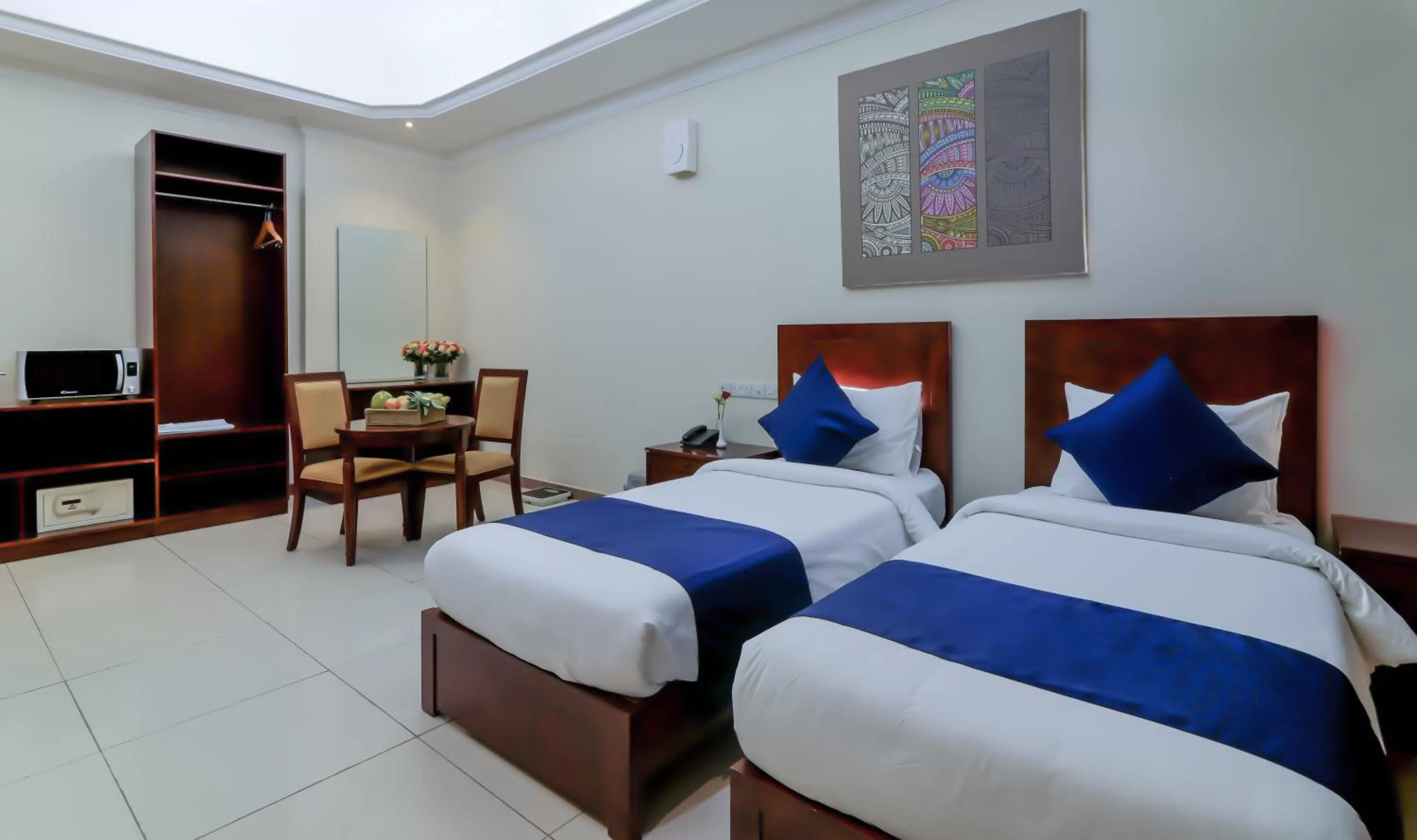 Bedroom, Bed in Tanzanite Executive Suites