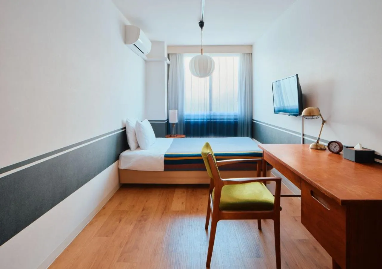 Bed in Hotel Graphy Nezu