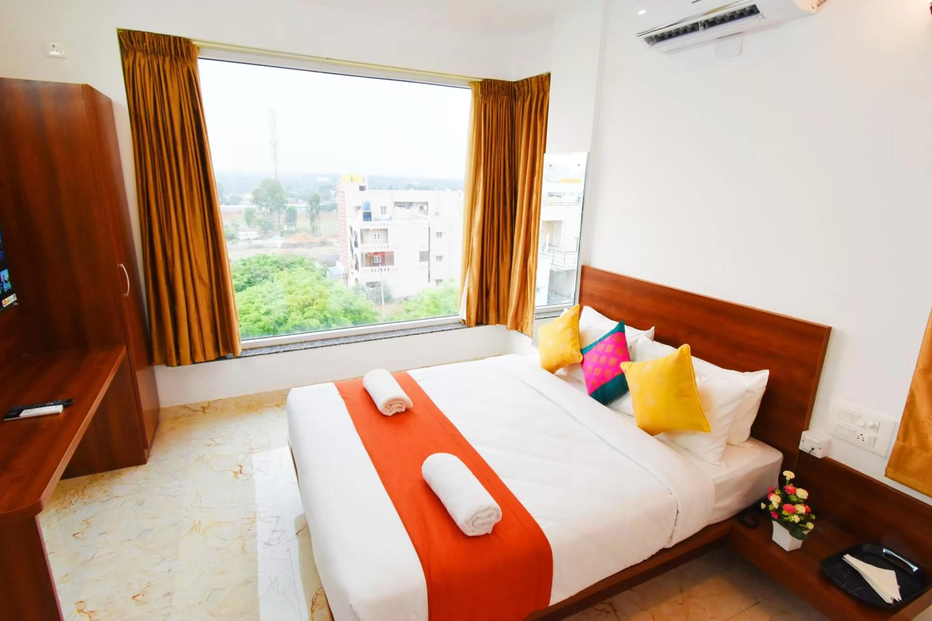 Photo of the whole room, Bed in Keerthis Royal Suites - Hotel Near Kempegowda International Airport