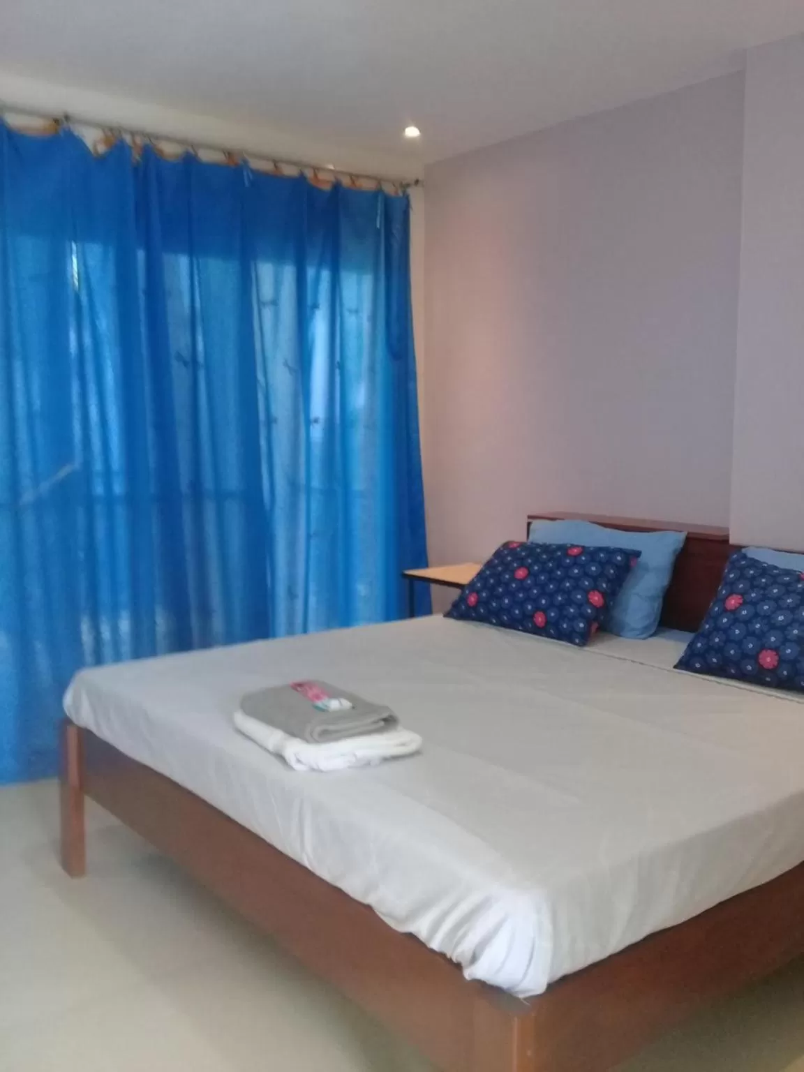 Photo of the whole room, Bed in D & B BLUESTAR BEACH RESORT