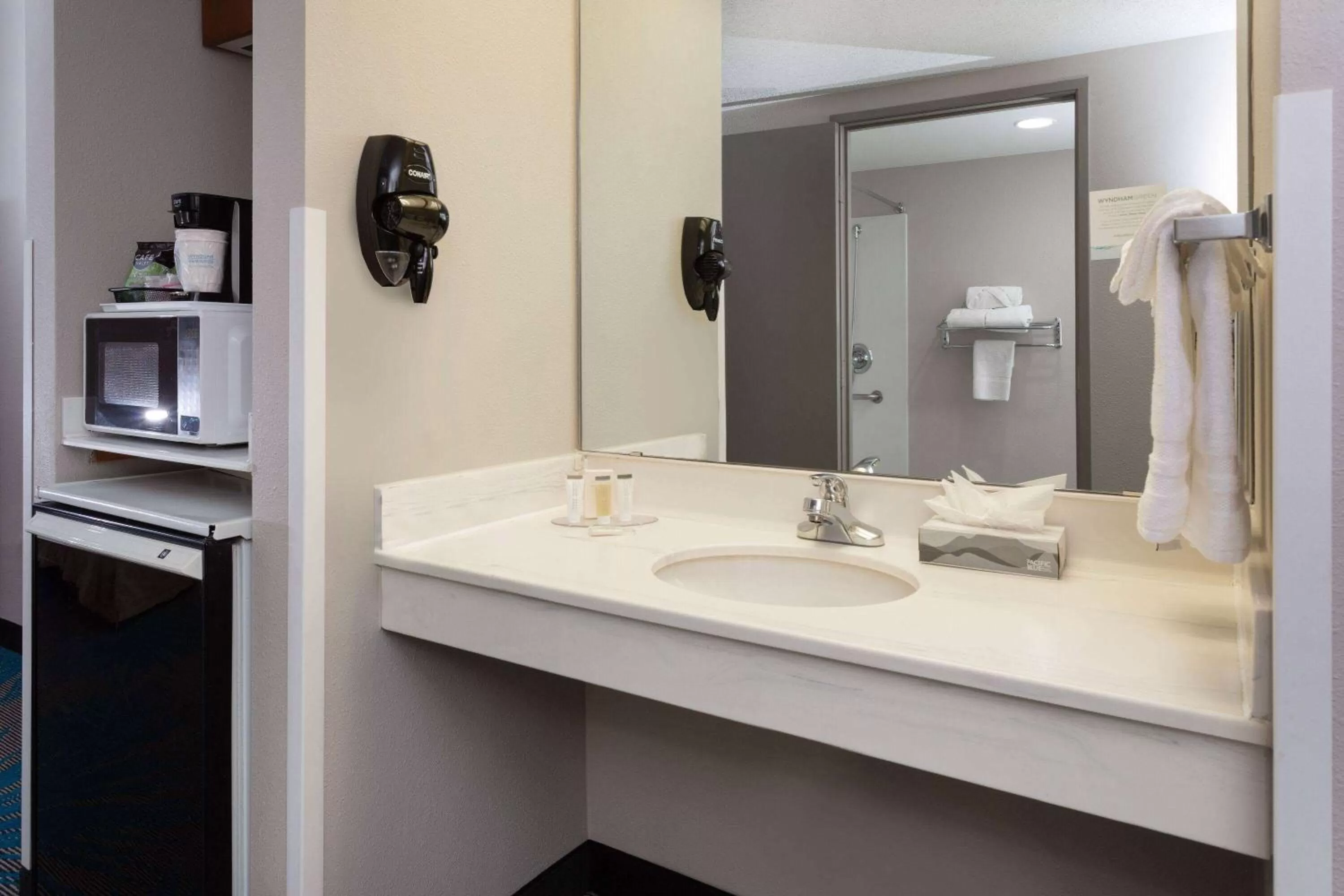 Bathroom in Days Inn & Suites by Wyndham Denver International Airport