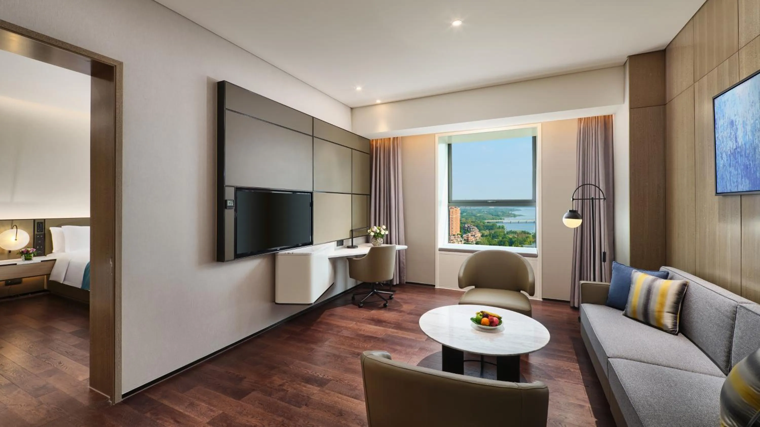 Living room in Crowne Plaza Wuhan Development Zone by IHG