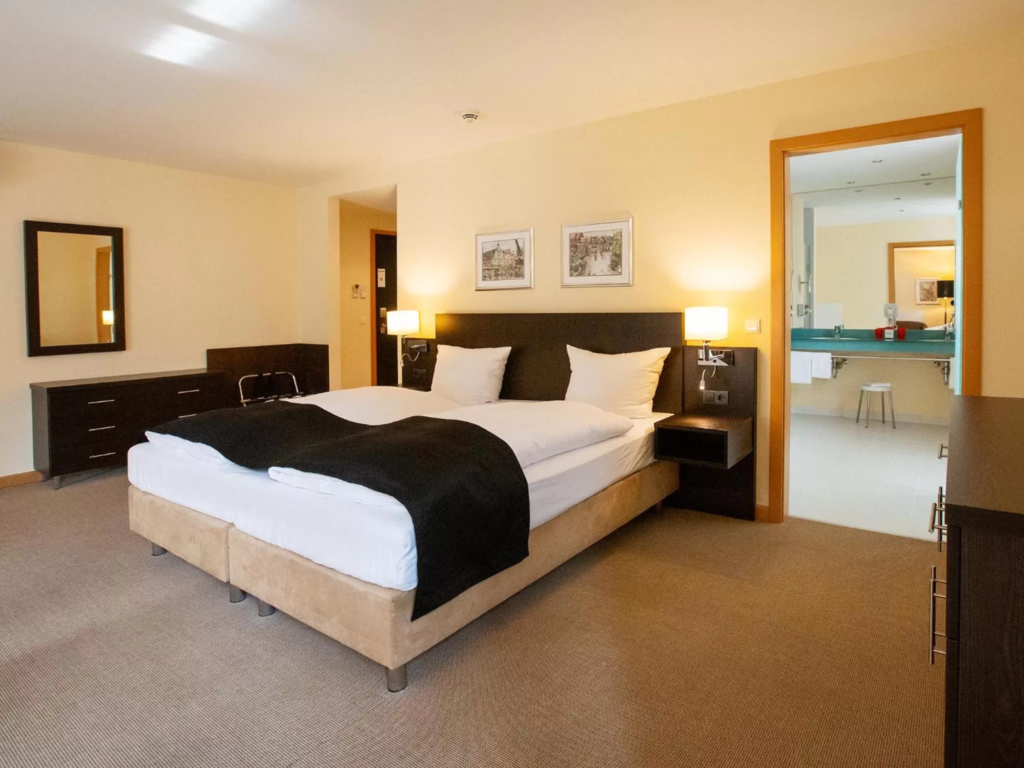 Photo of the whole room, Bed in DORMERO Hotel Altes Kaufhaus Lüneburg