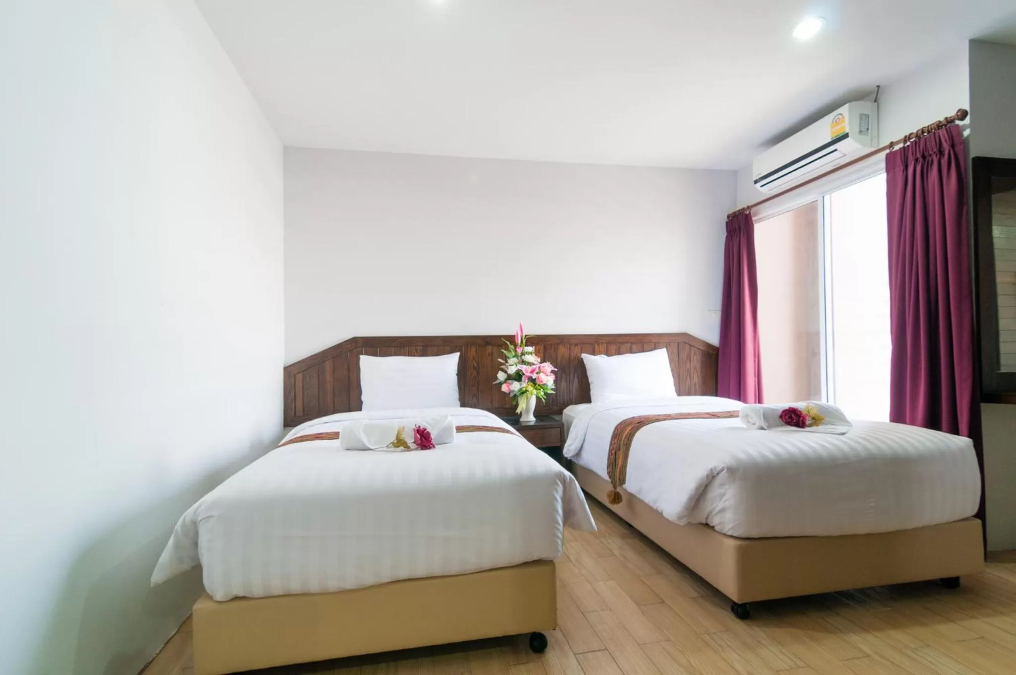 Bed in The Chateau Chiangmai Residence