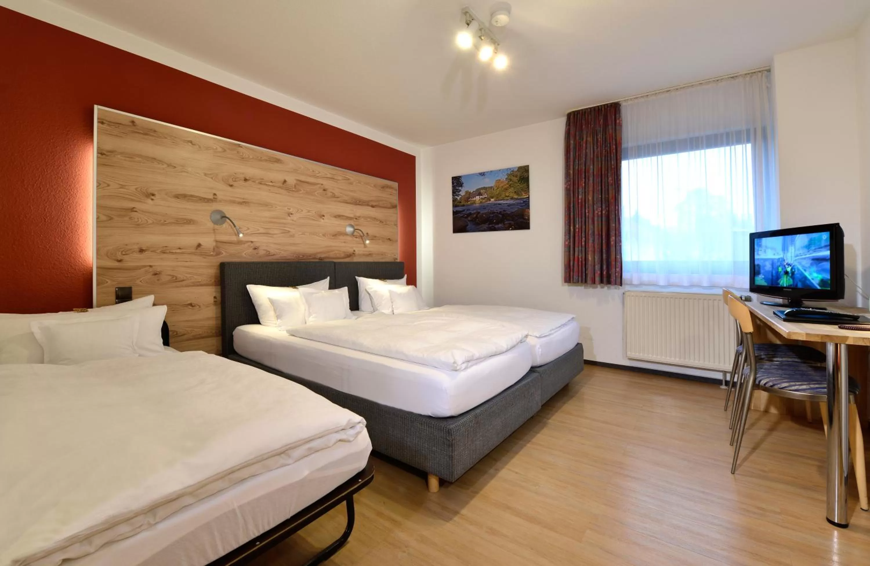 Photo of the whole room, Bed in Hotel & Wirtshaus Hansen