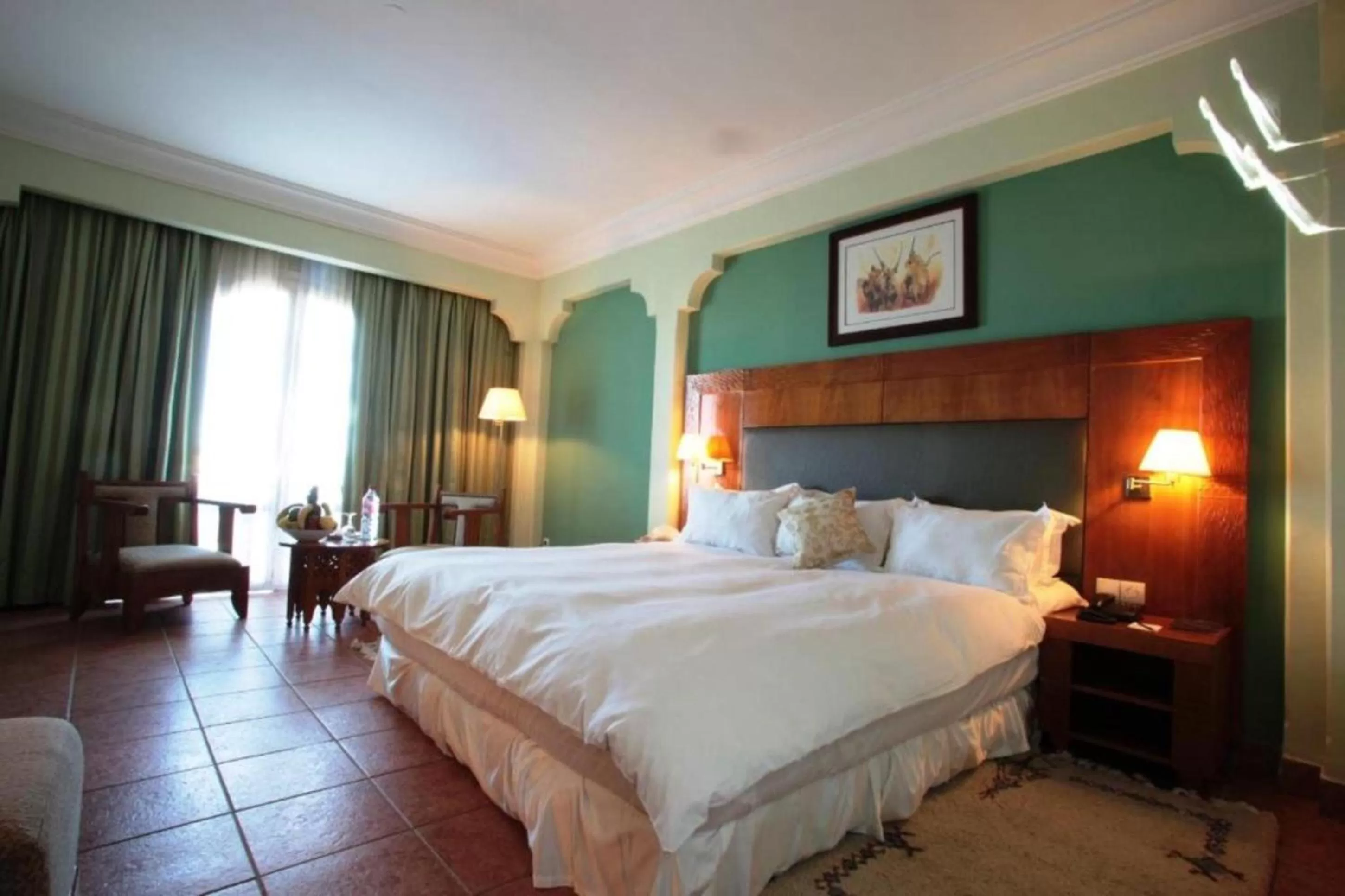 Bed in Grand Mogador Menara & Spa