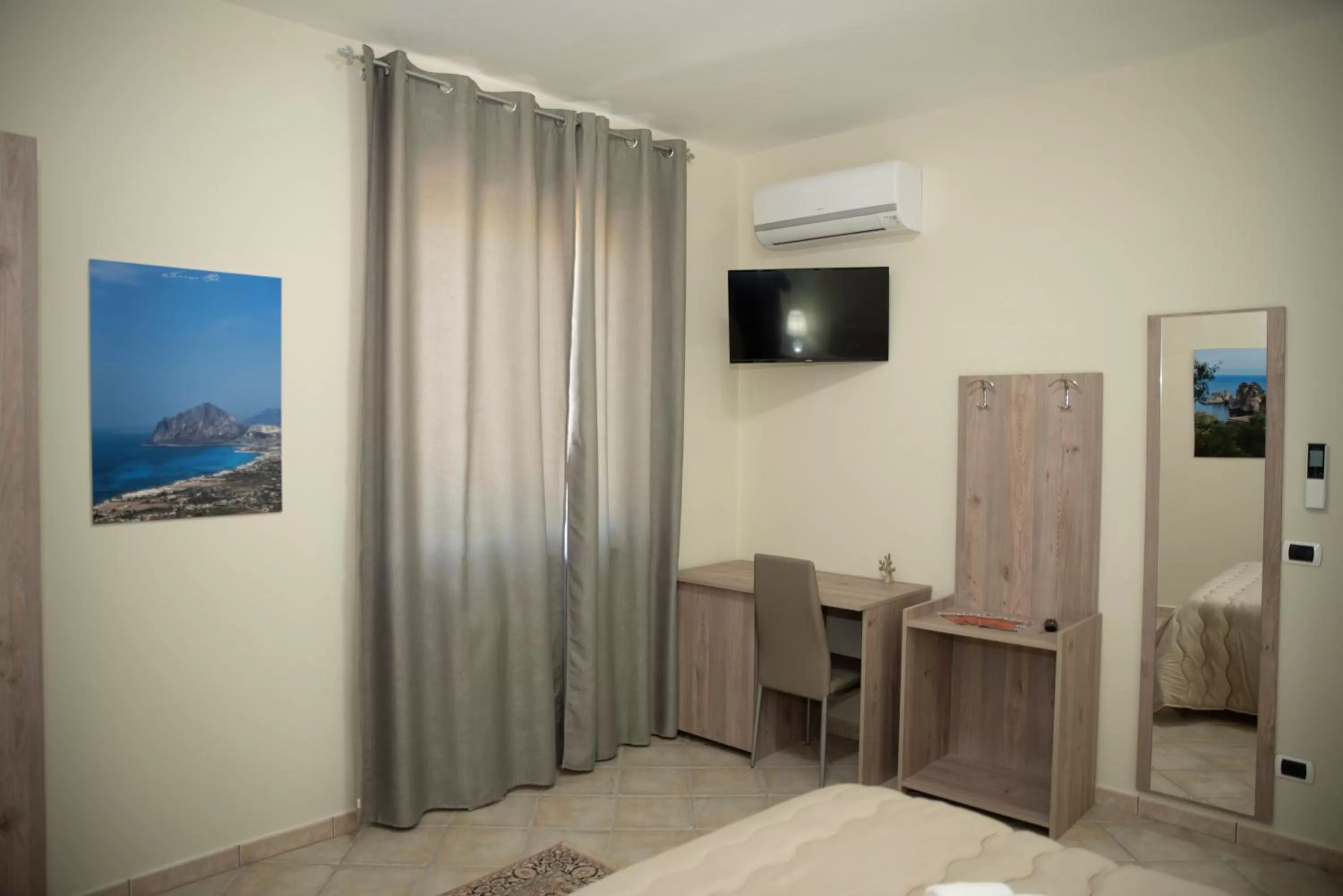 Photo of the whole room, TV/Entertainment Center in B&B La Terrazza Degli Scrittori