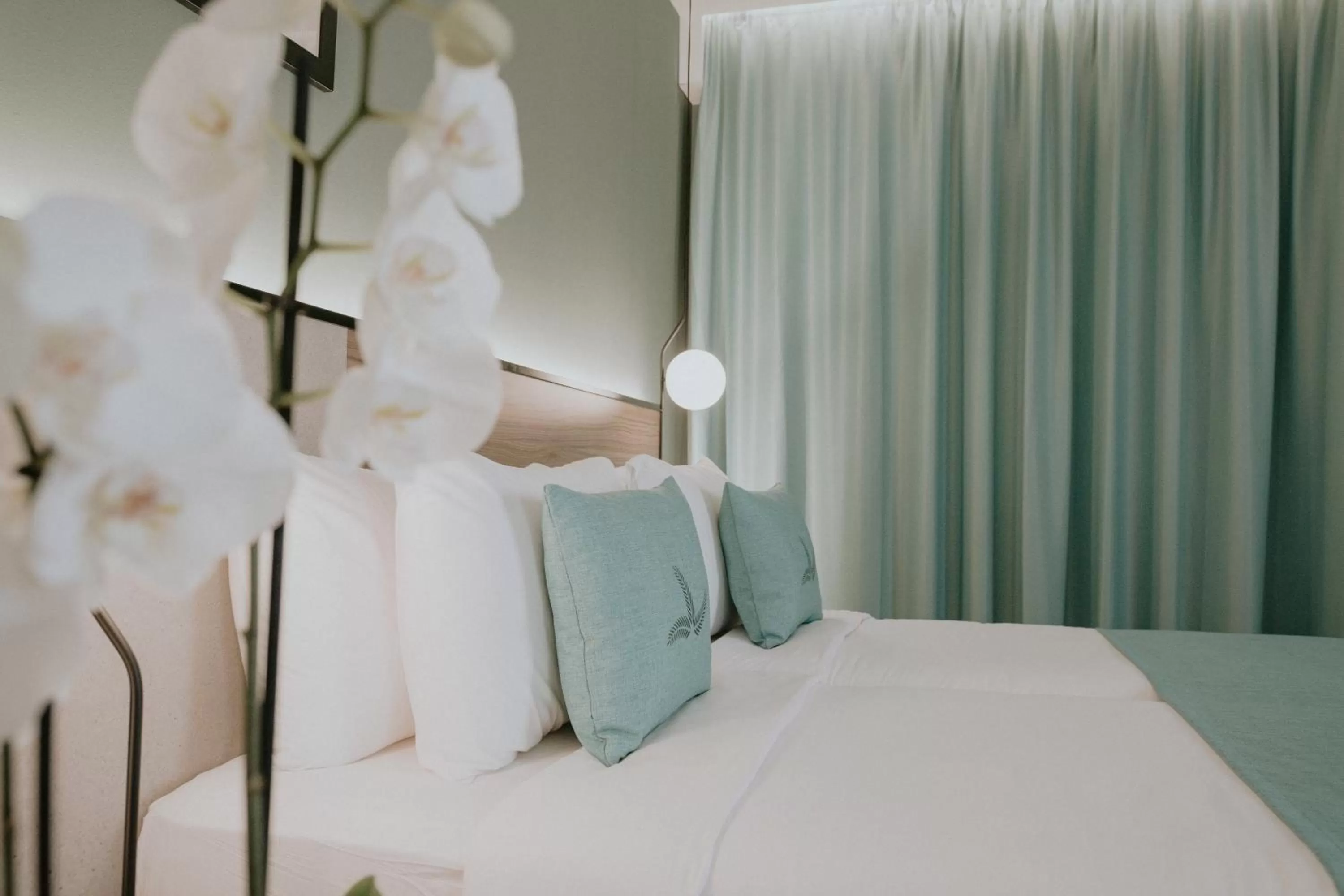 Bed in Catalina Plaza Hotel Sostenible