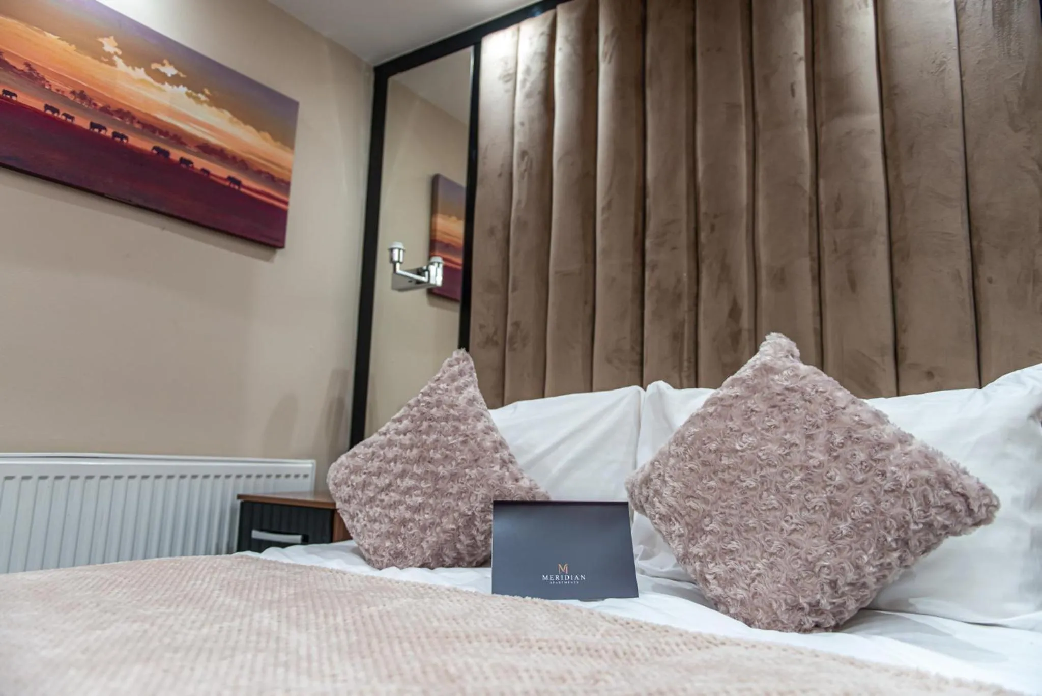 Bed in Meridian Serviced Apartments