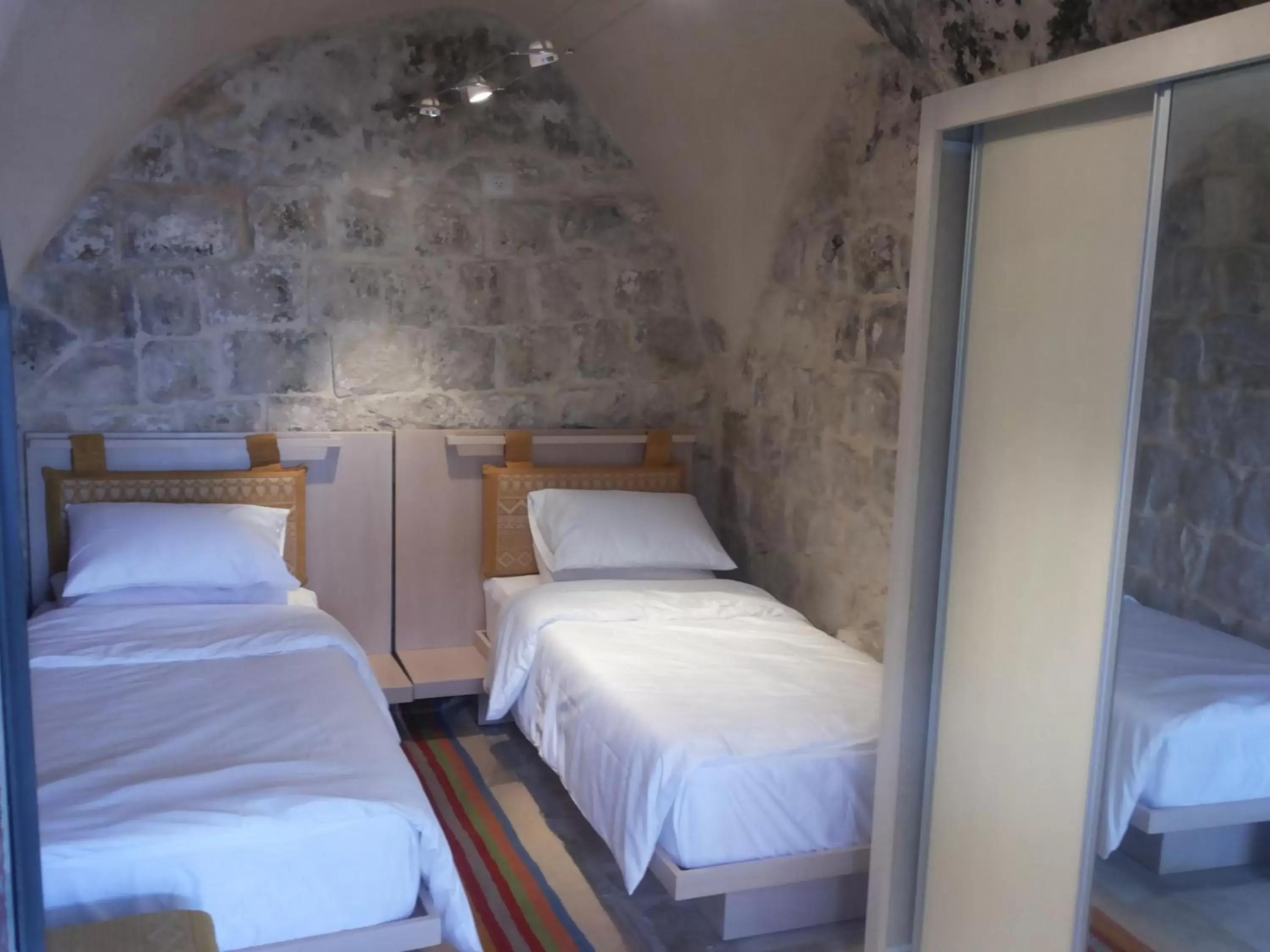 Single Bed in Male Dormitory Room in Khan Alwakala Hotel Single Bed in Male Dormitory Room in Khan Alwakala Hotel