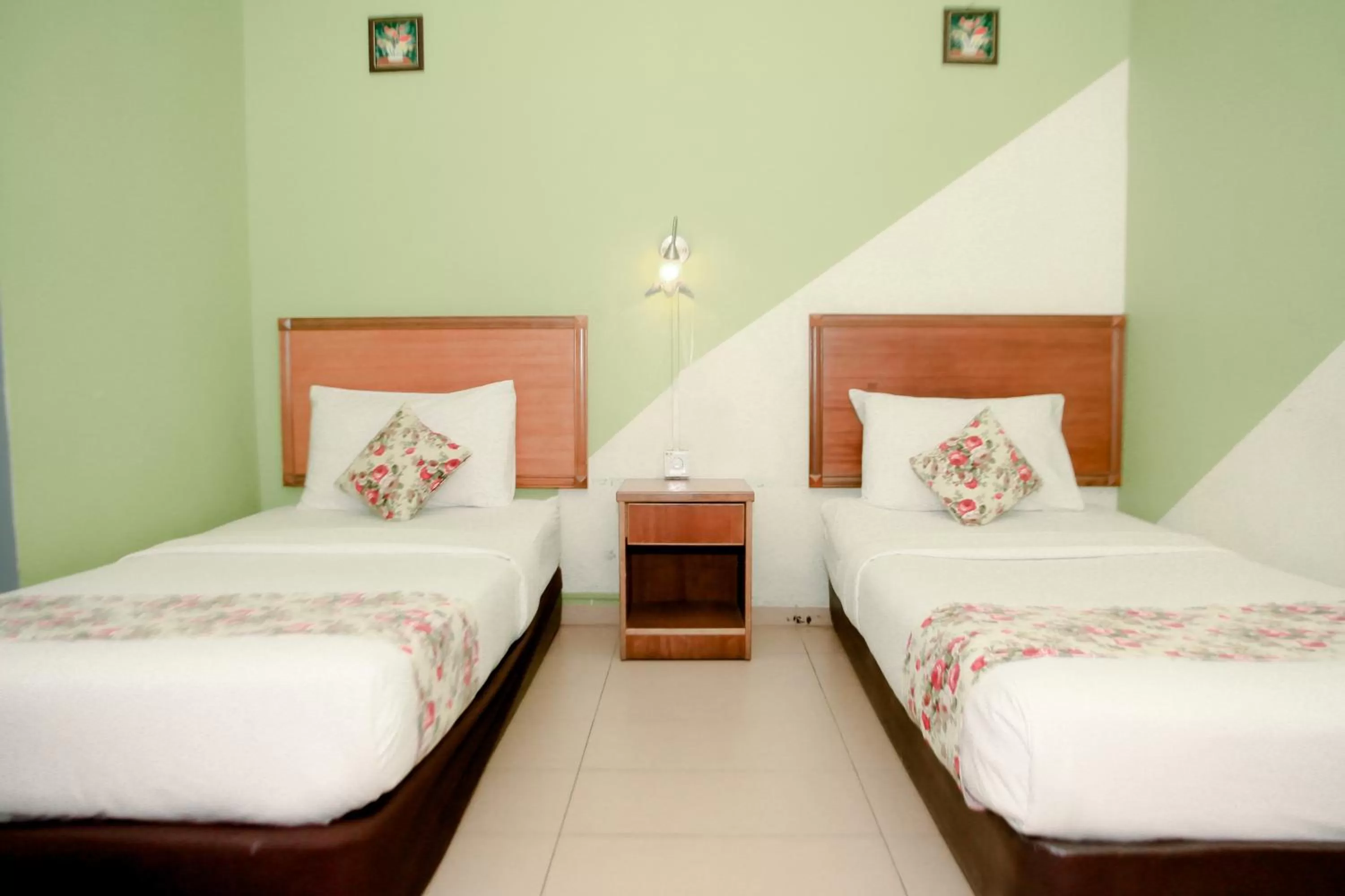 Bed in HOTEL D VIEW MERSING