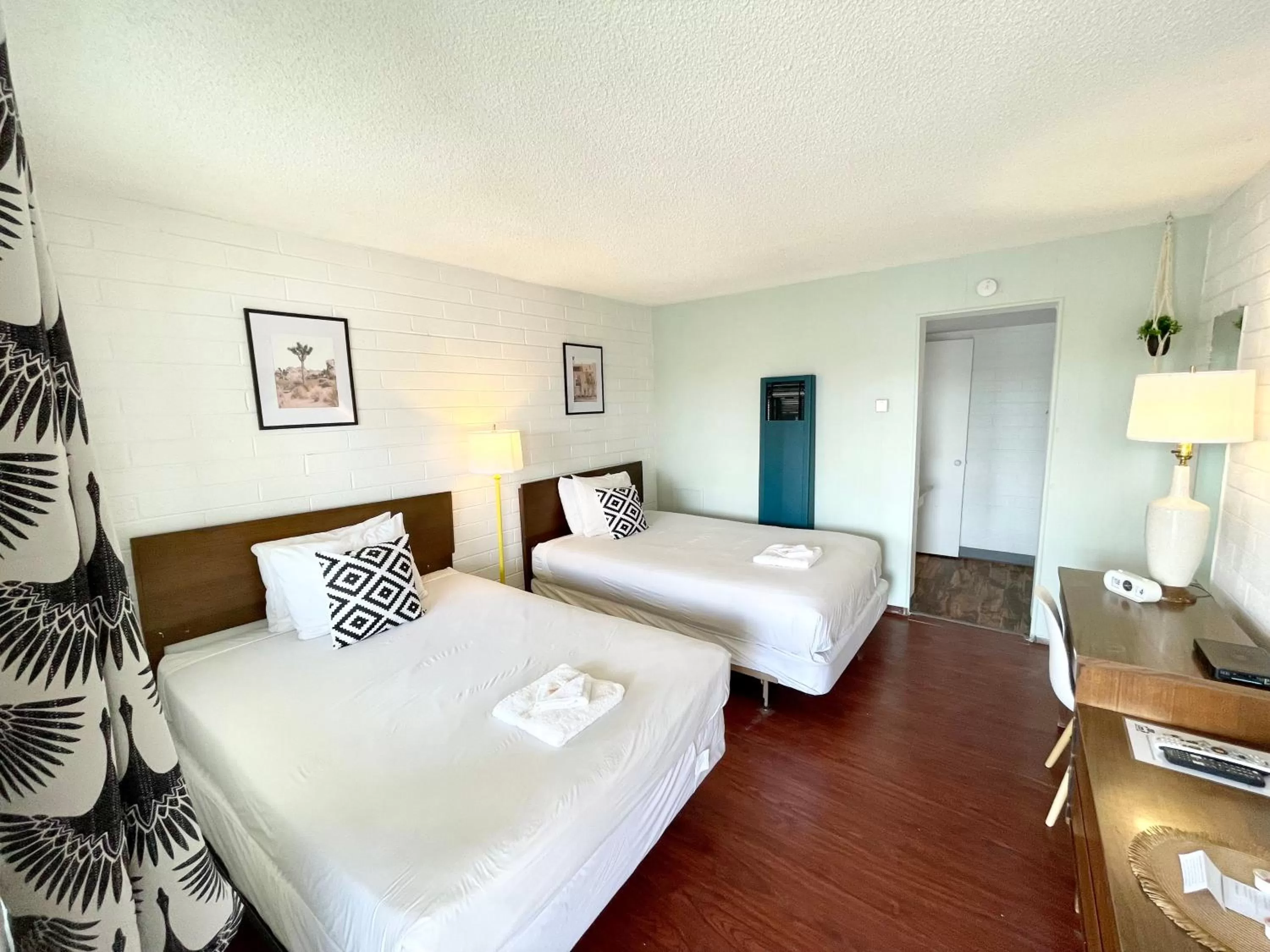 Bed in The Postcard Motel