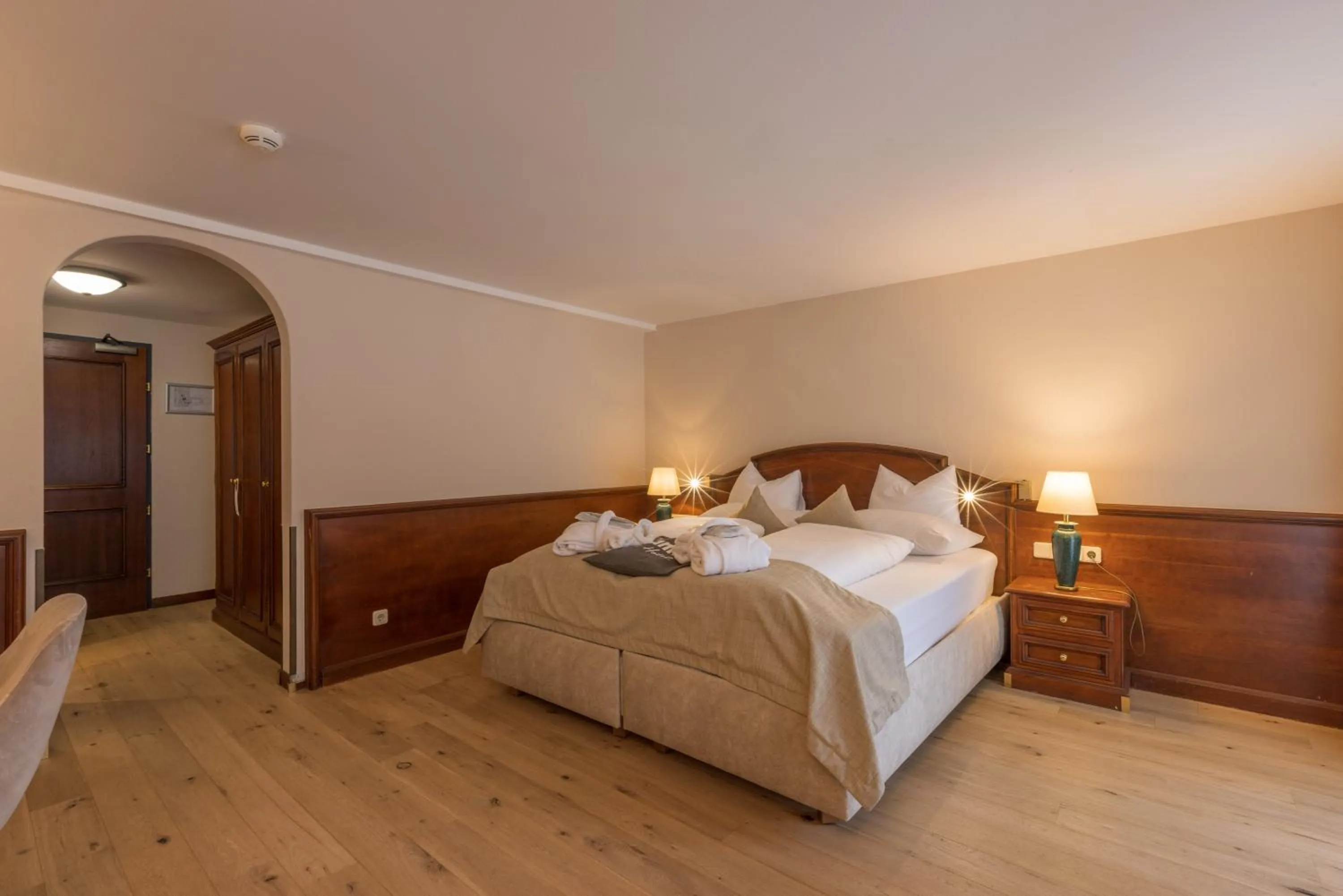 Bed in MANNI das Hotel