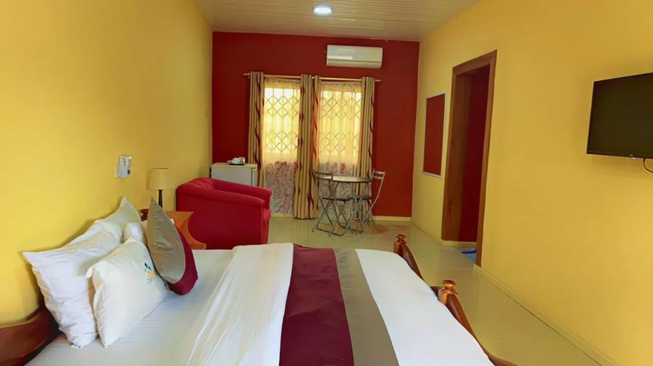 Photo of the whole room, Bed in Hans Cottage Botel