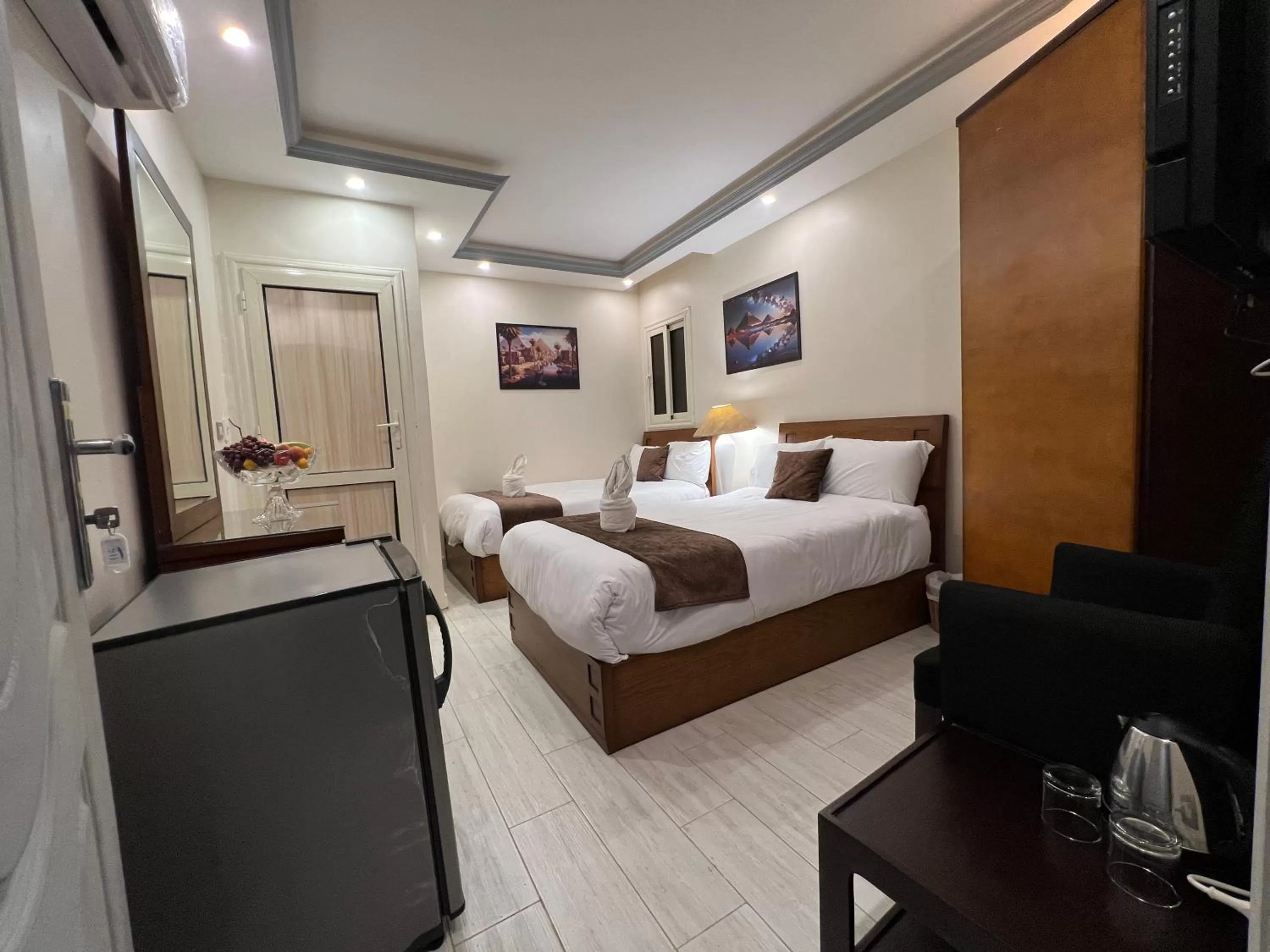 Bed, Seating Area in The Muse Pyramids