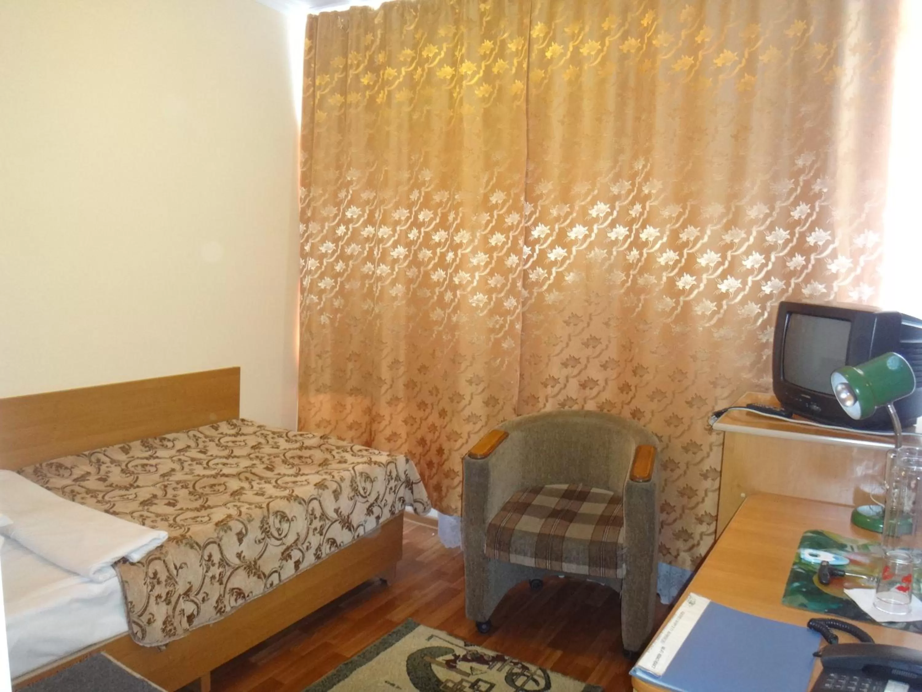 Bed in Aktobe Hotel