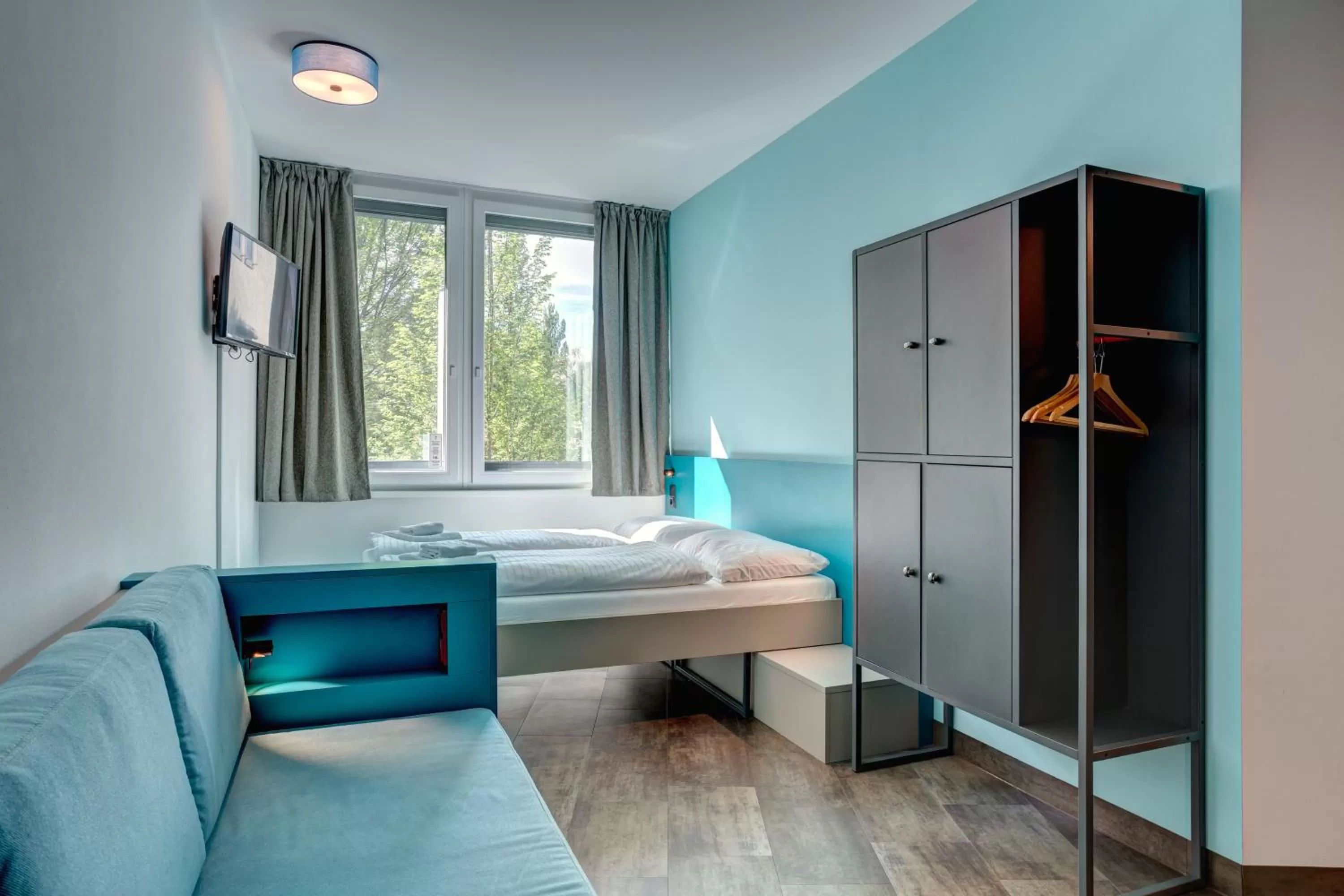 Photo of the whole room, Bed in MEININGER Hotel München Olympiapark