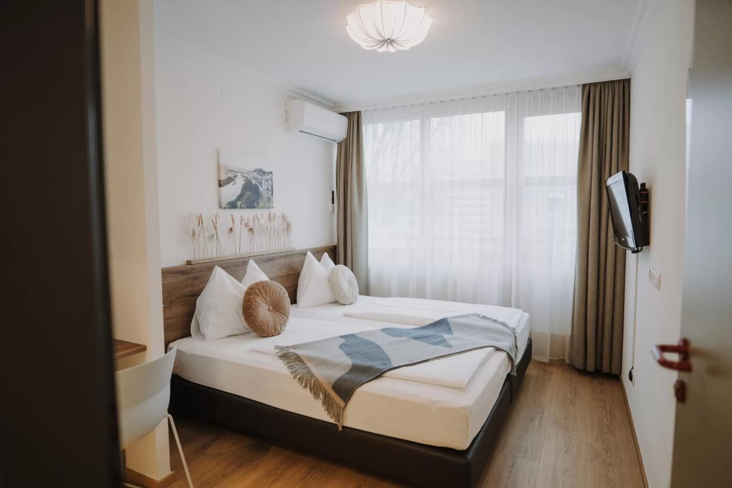 Bedroom in Parkhotel Brunauer