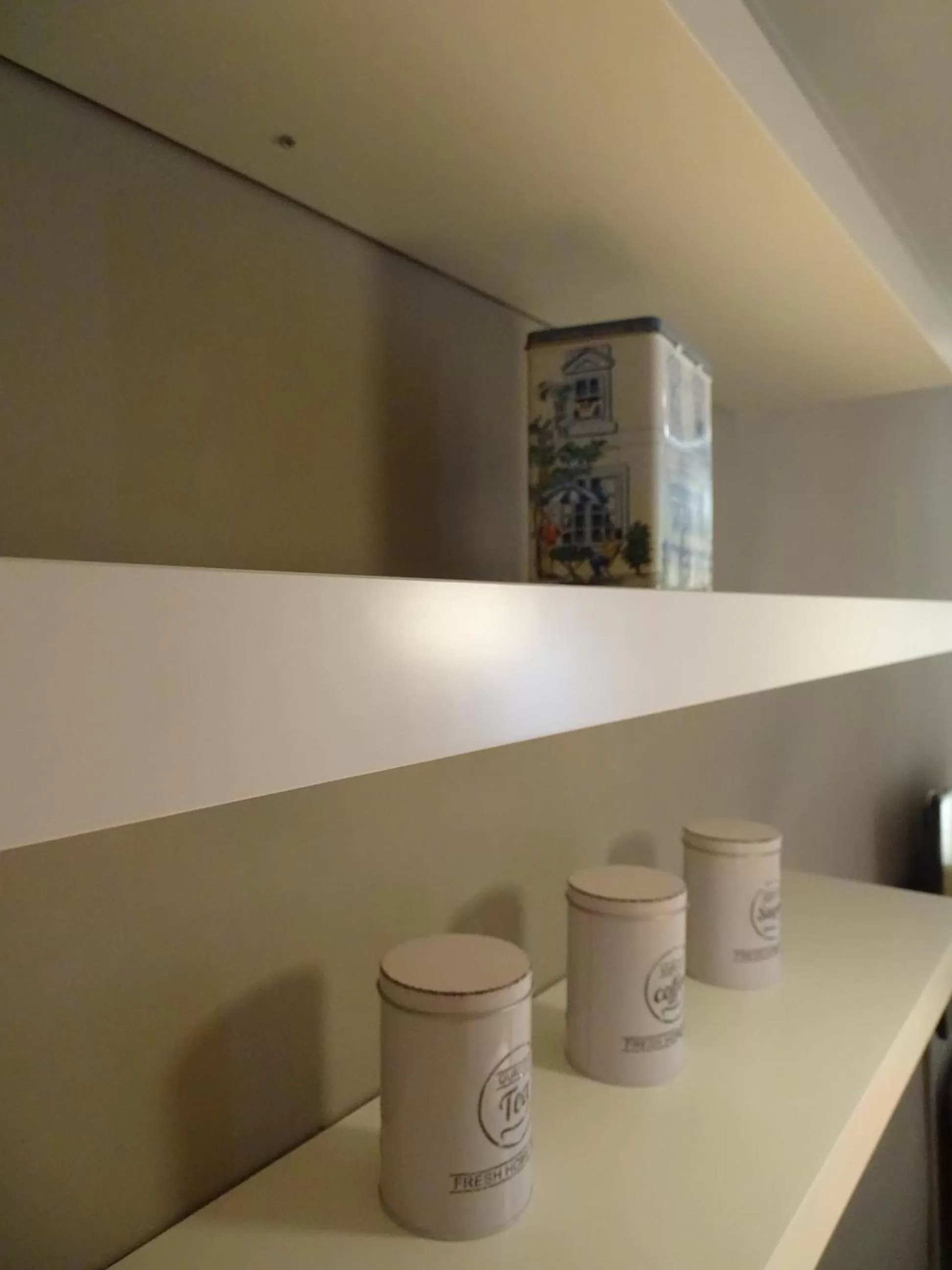 Kitchen or kitchenette in Suite 11