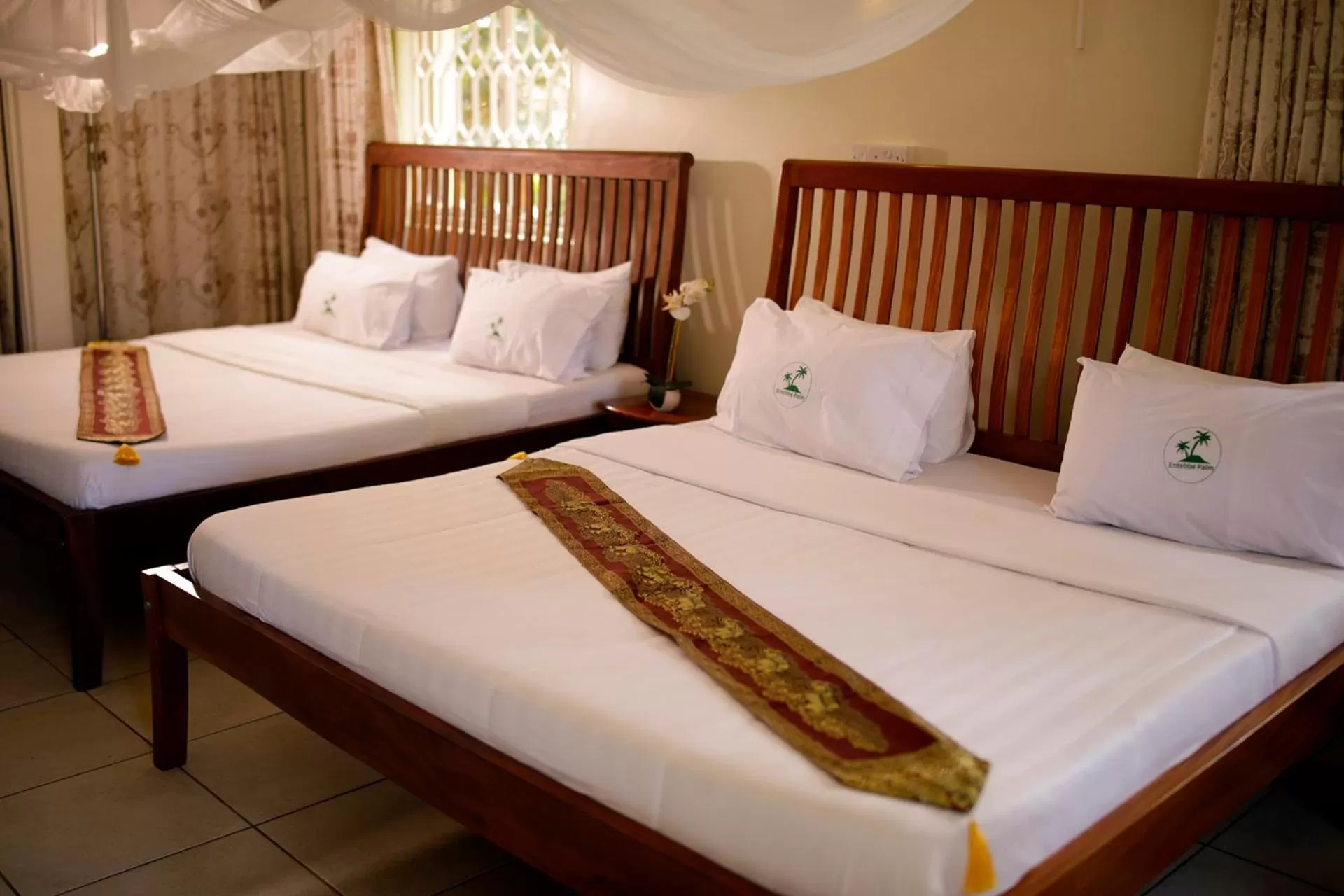 Bed in Entebbe Palm Hotel