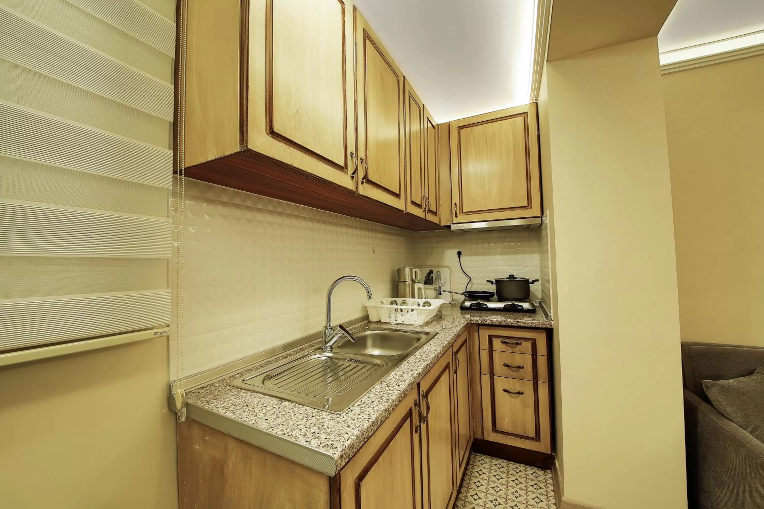 Kitchen or kitchenette in Katelya Hotel