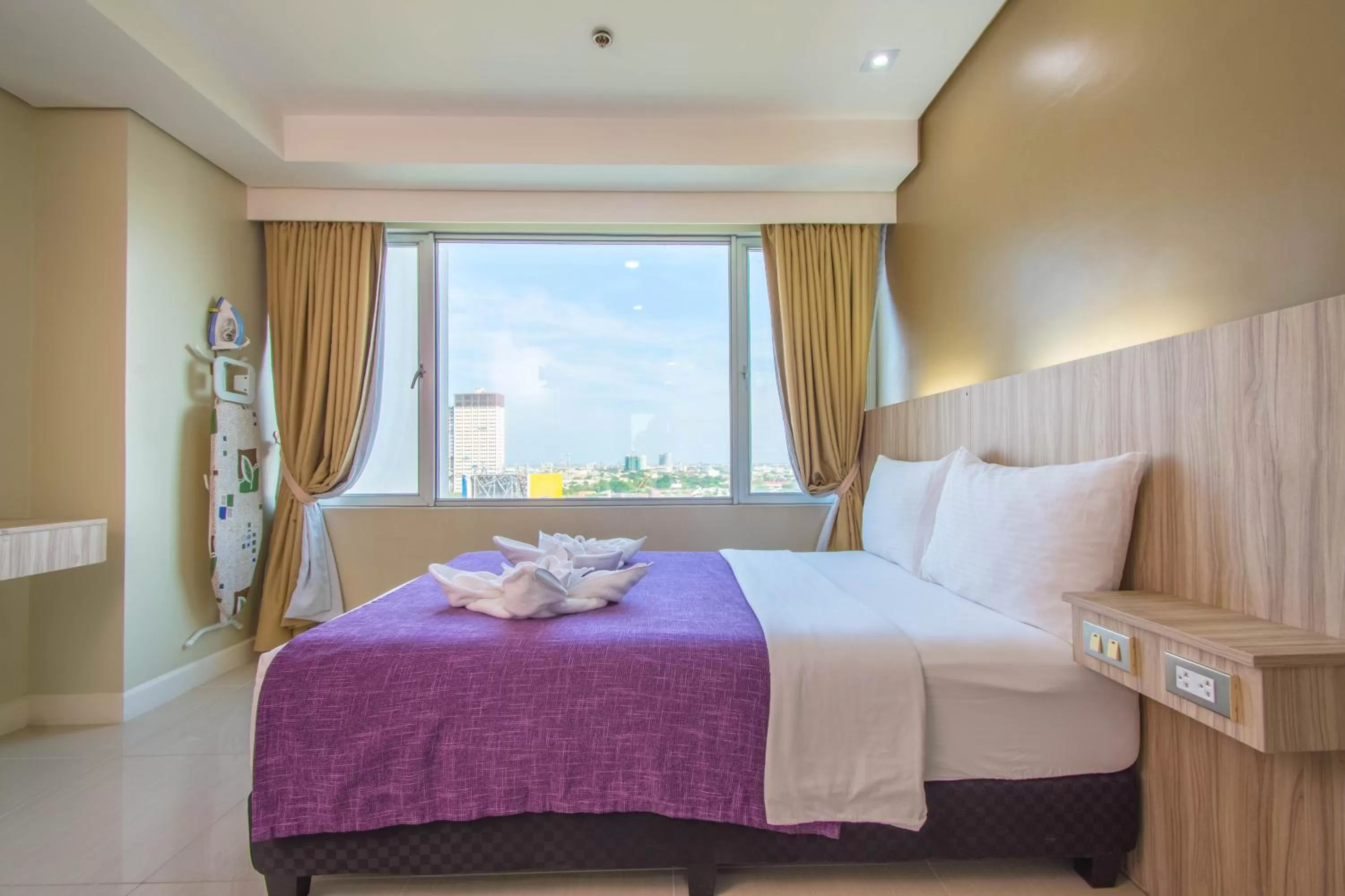 Bed in Alicia Apartelle