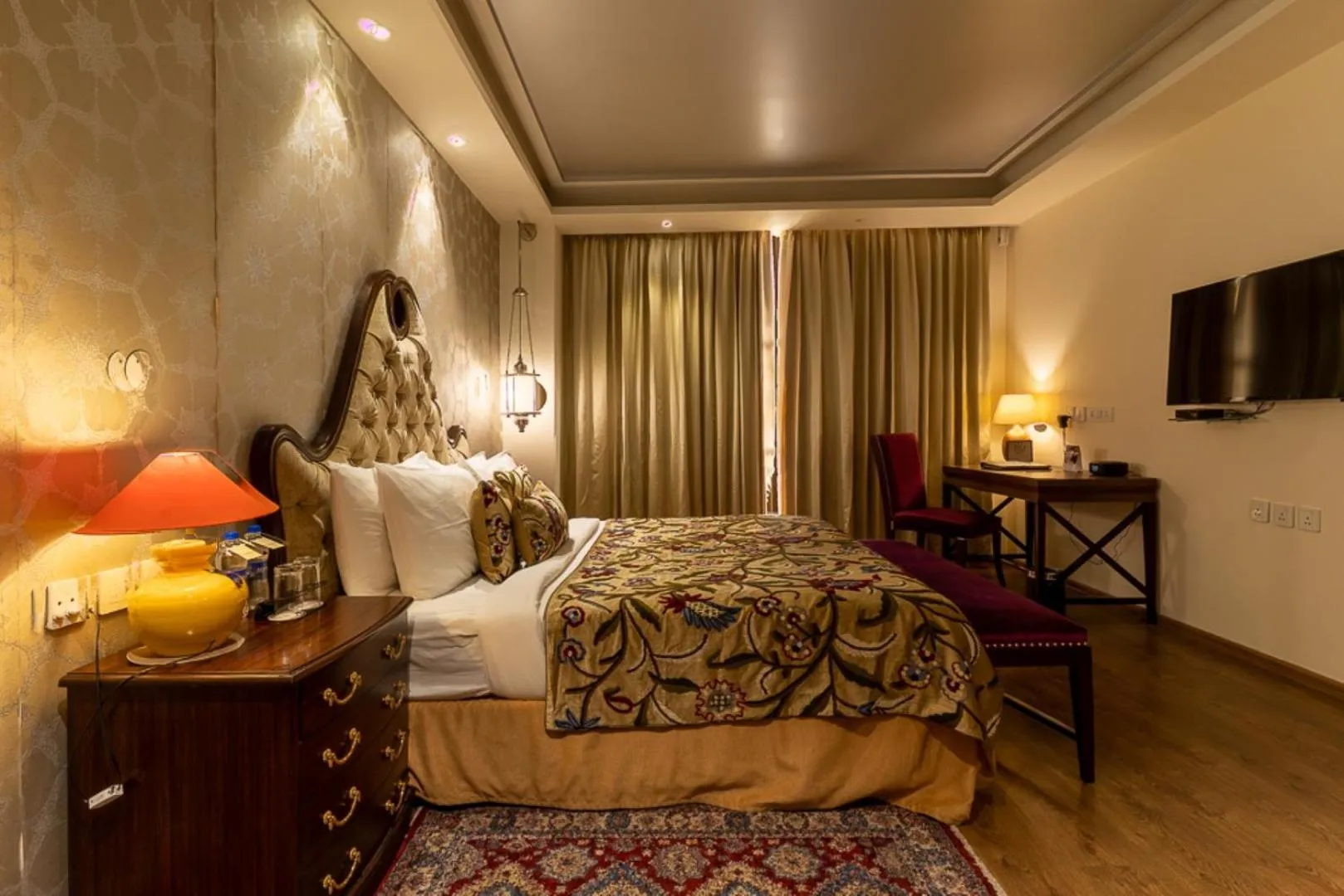 Photo of the whole room, Bed in Indraprastha Spa Resort