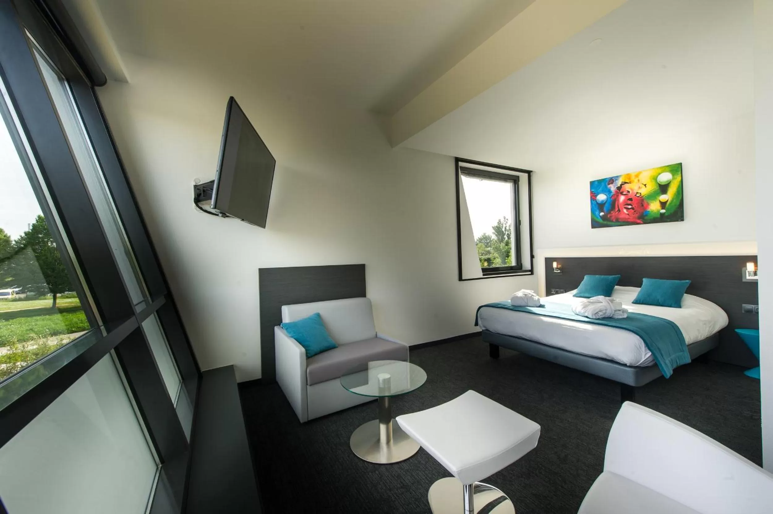 Bedroom, Bed in Hôtel Restaurant Athena Spa