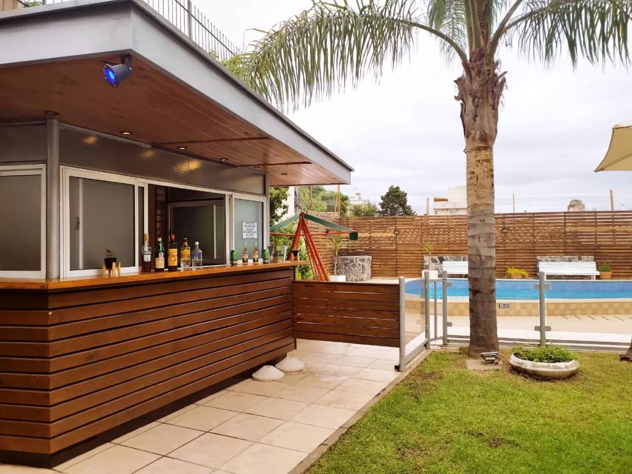 Swimming pool in Gran Lourdes Hotel by CPH
