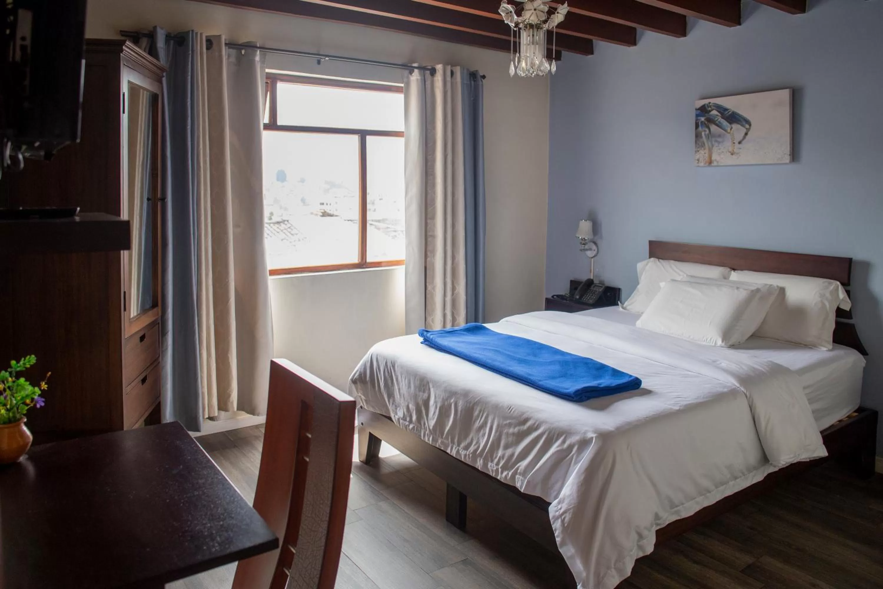 Bed in Hotel Colonial San Agustin