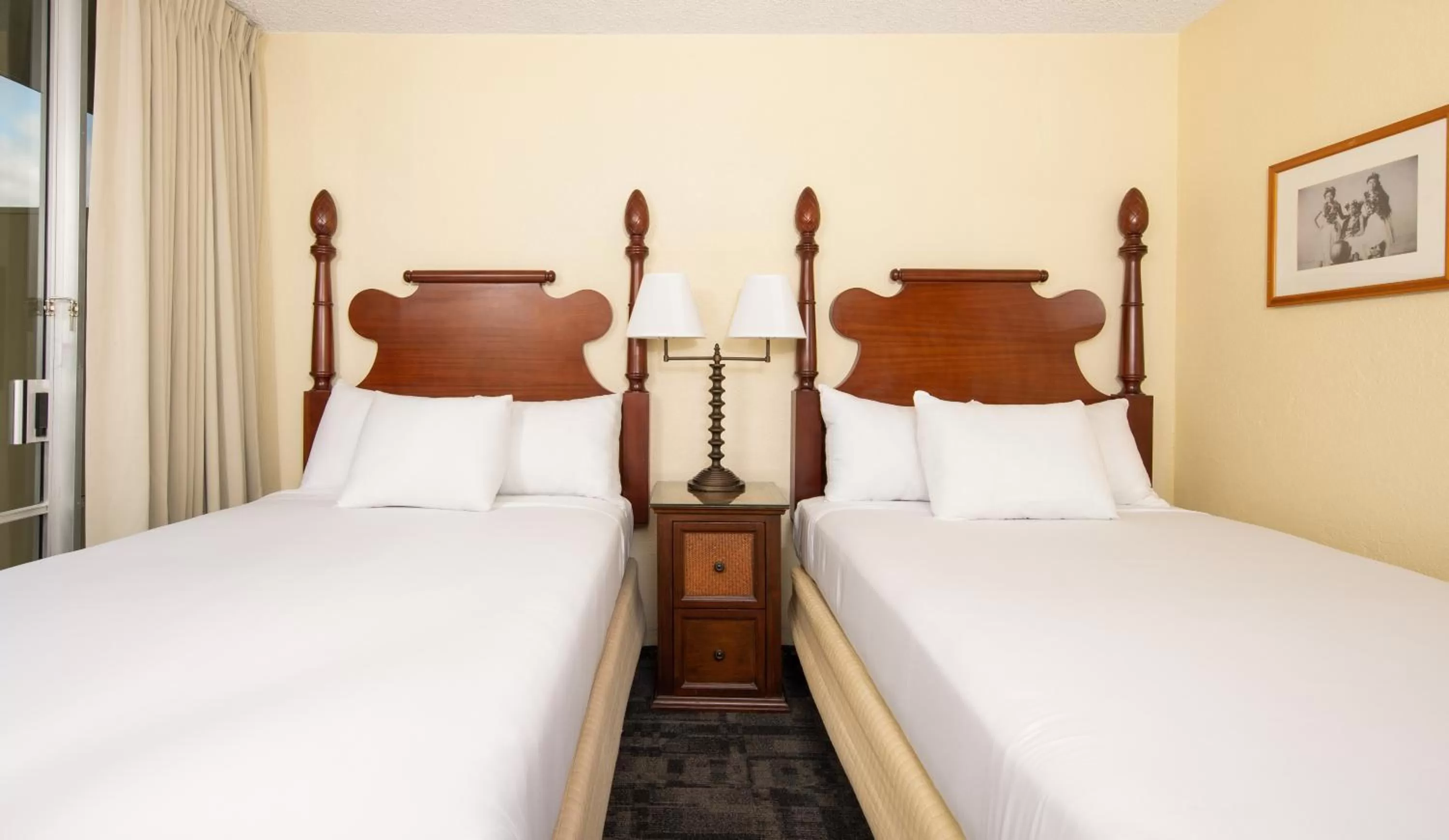 Bed in Ohia Waikiki Studio Suites