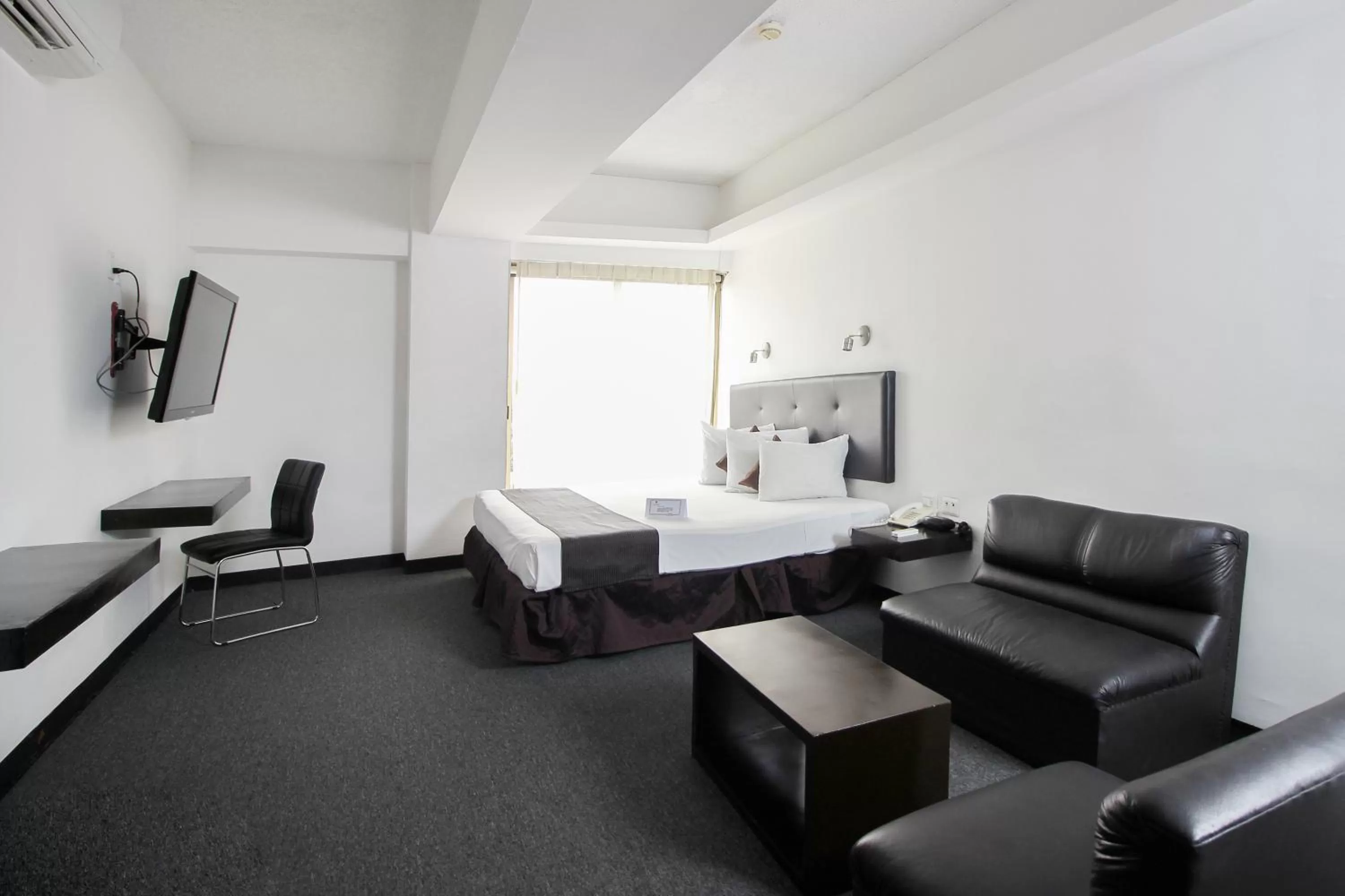 View (from property/room), Bed in Hotel Maya Yucatan