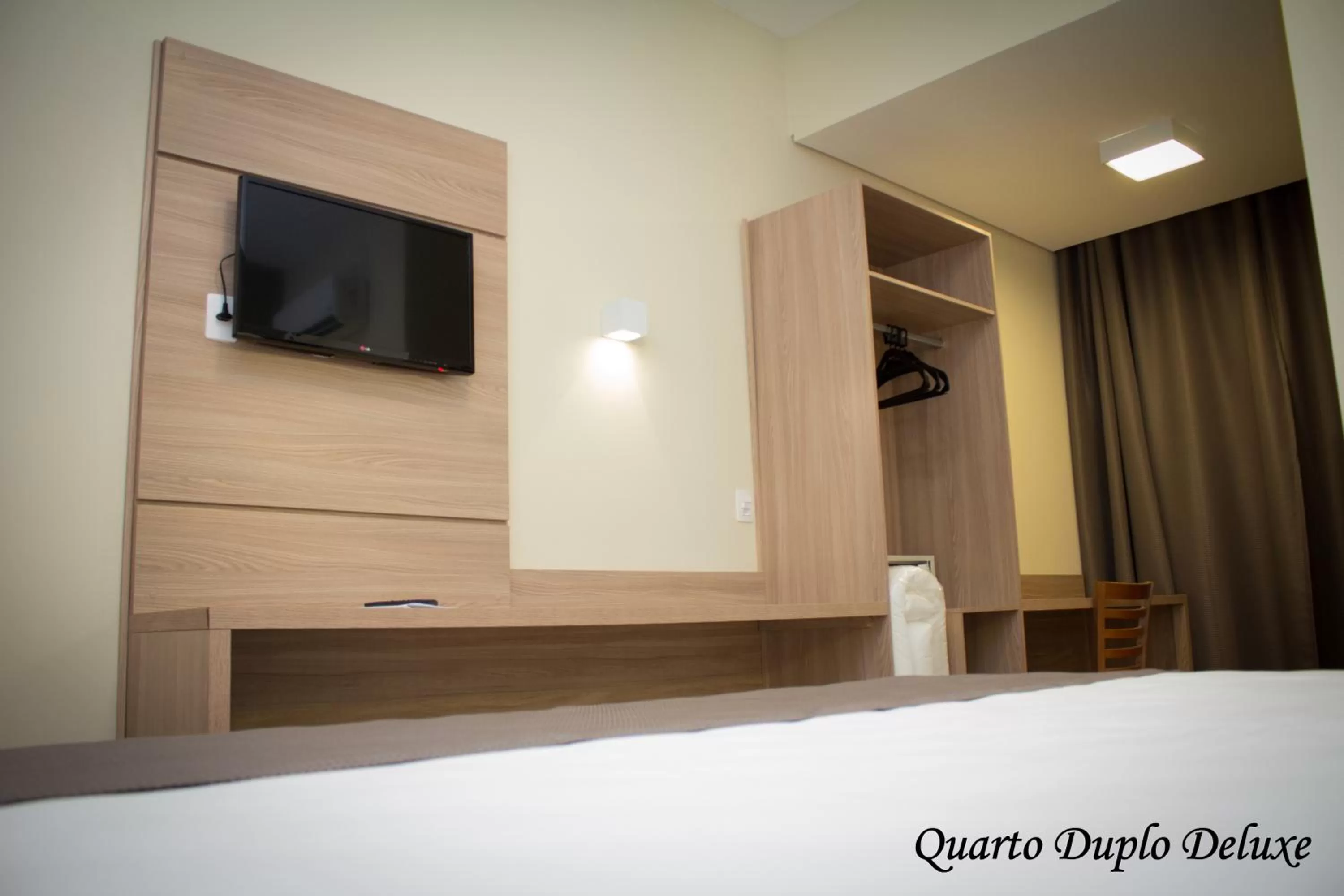 Bed in Minas Platinum Hotel & Convention