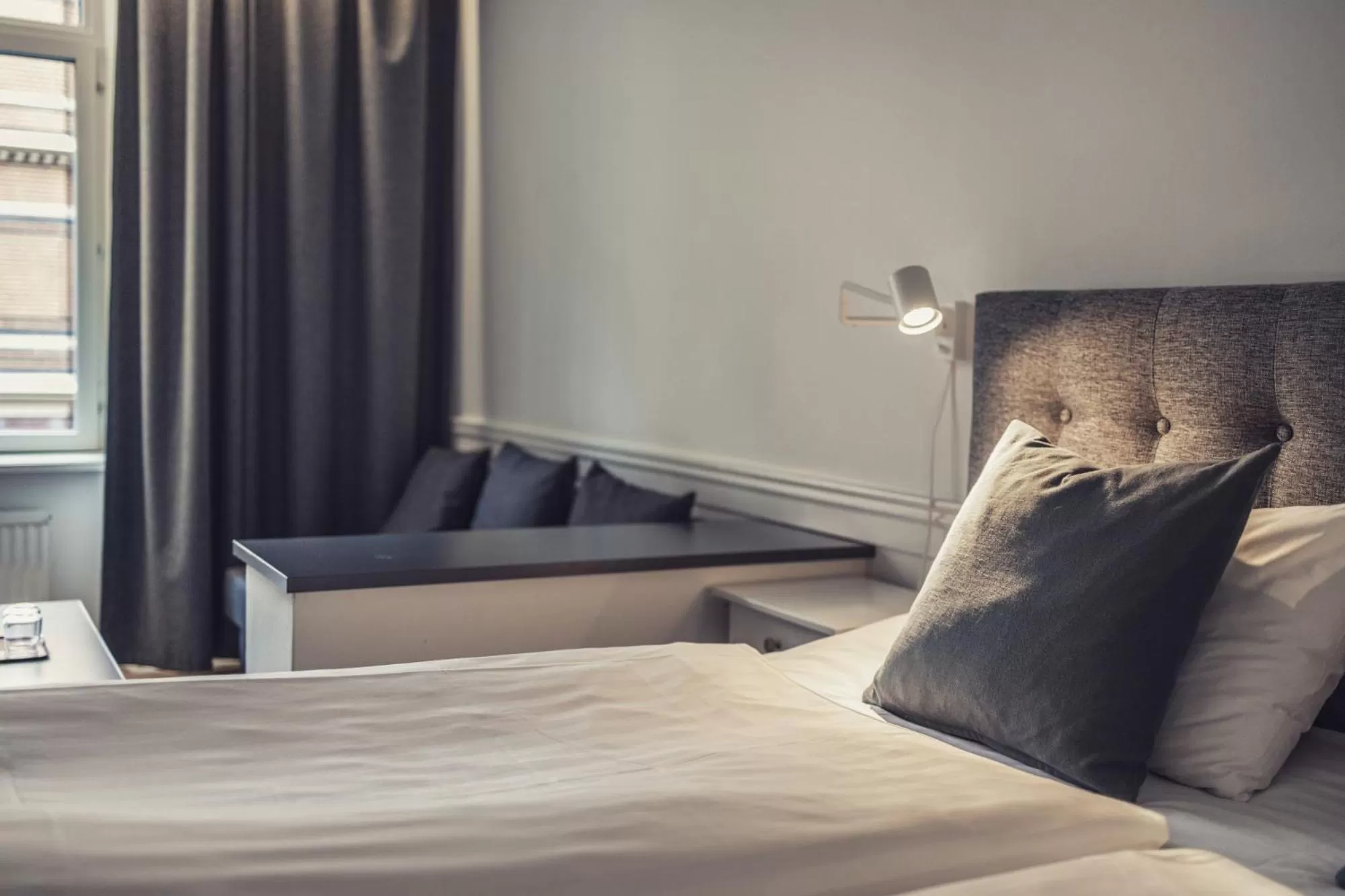 Bed in Hotel Poseidon