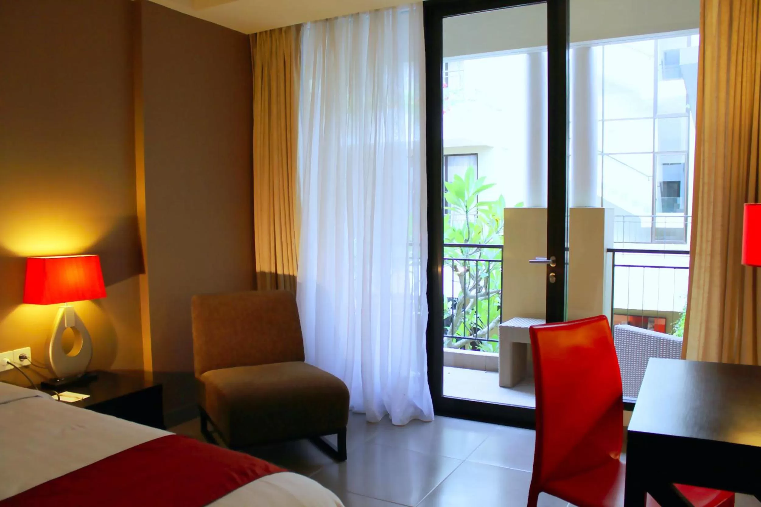 Bed in 100 Sunset Kuta Hotel & Ballroom