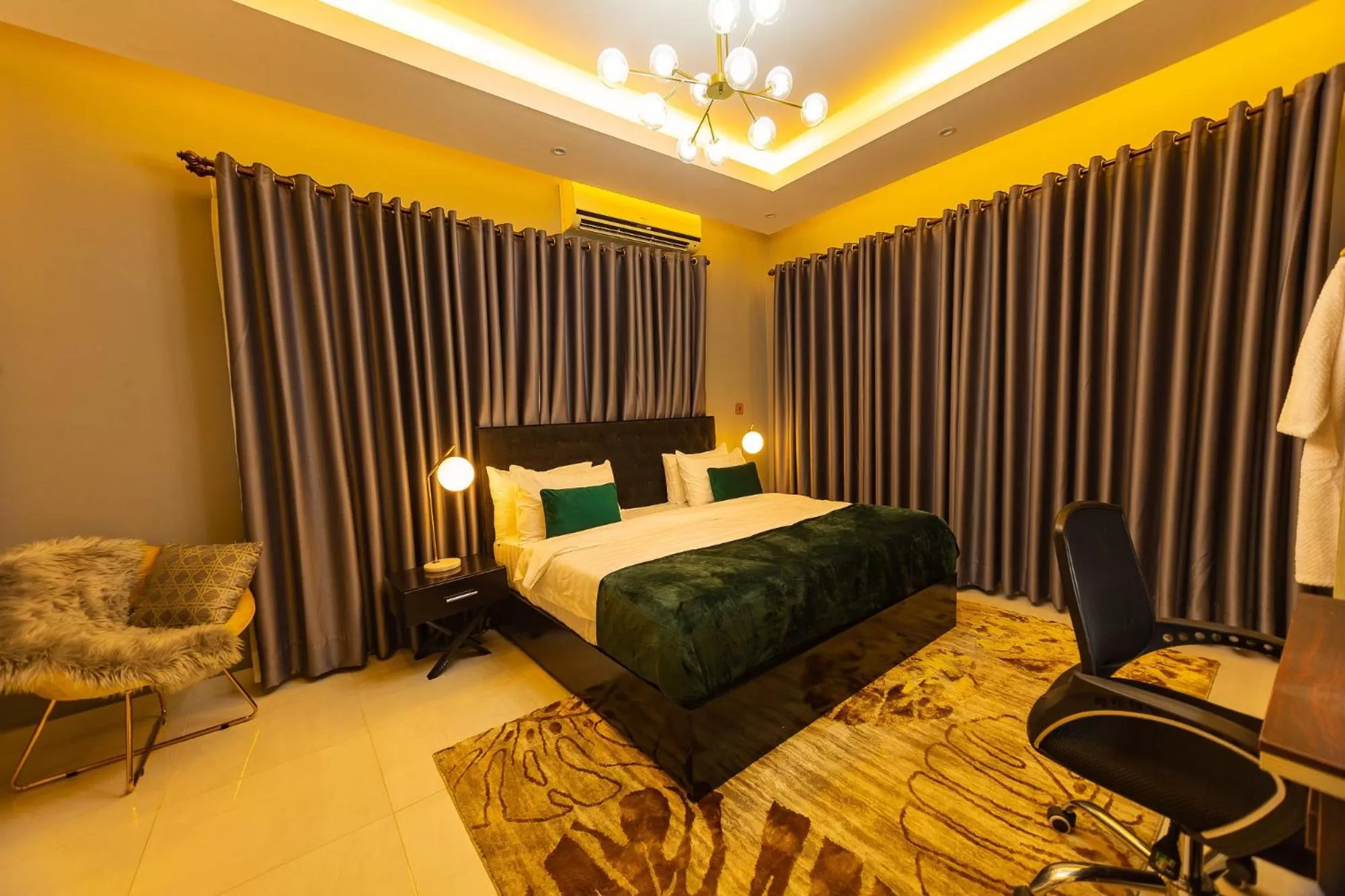 Bed in The Avery Suites, East Legon