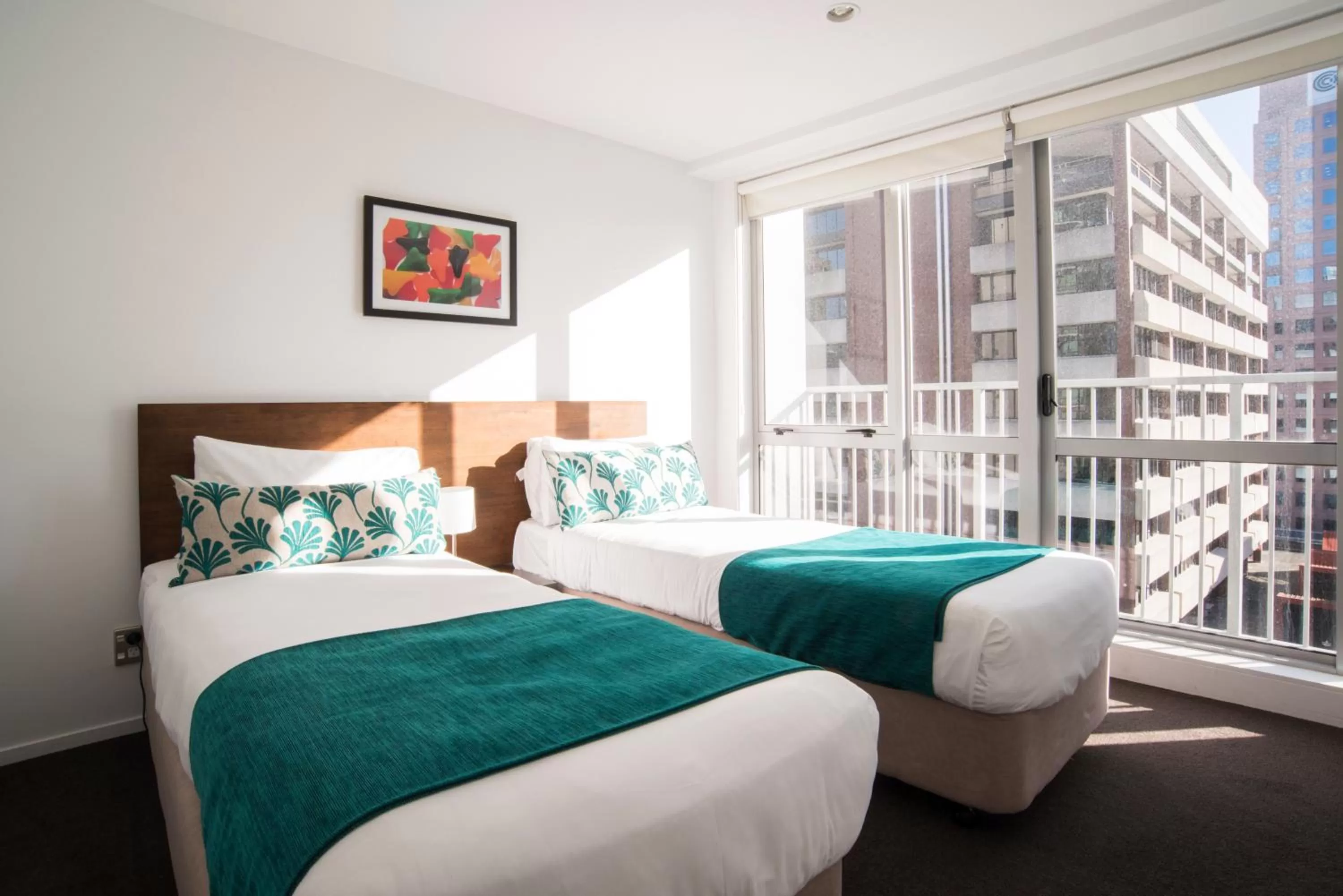 Bed in Barclay Suites