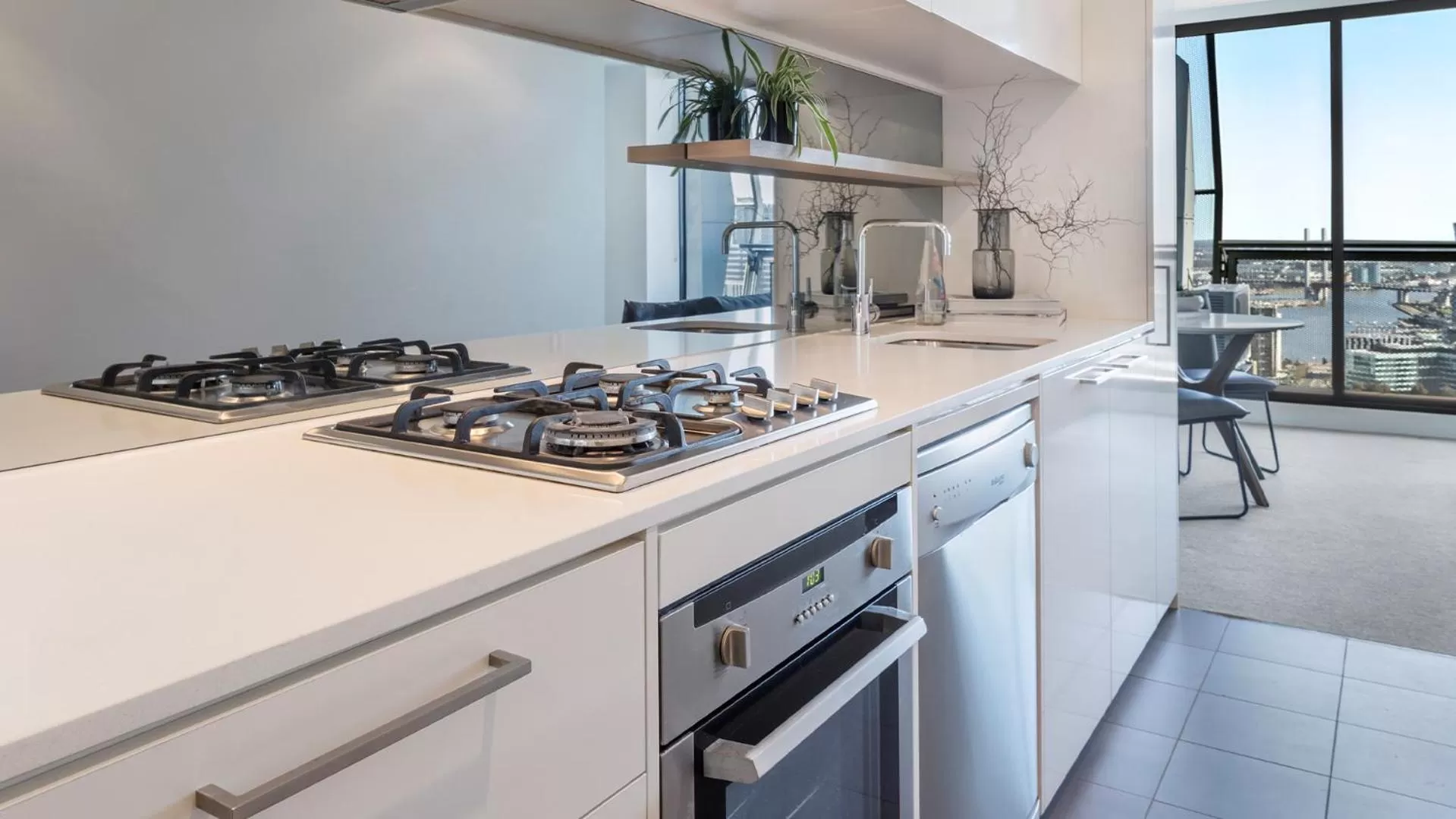 Kitchen or kitchenette in Oaks Melbourne on William Suites