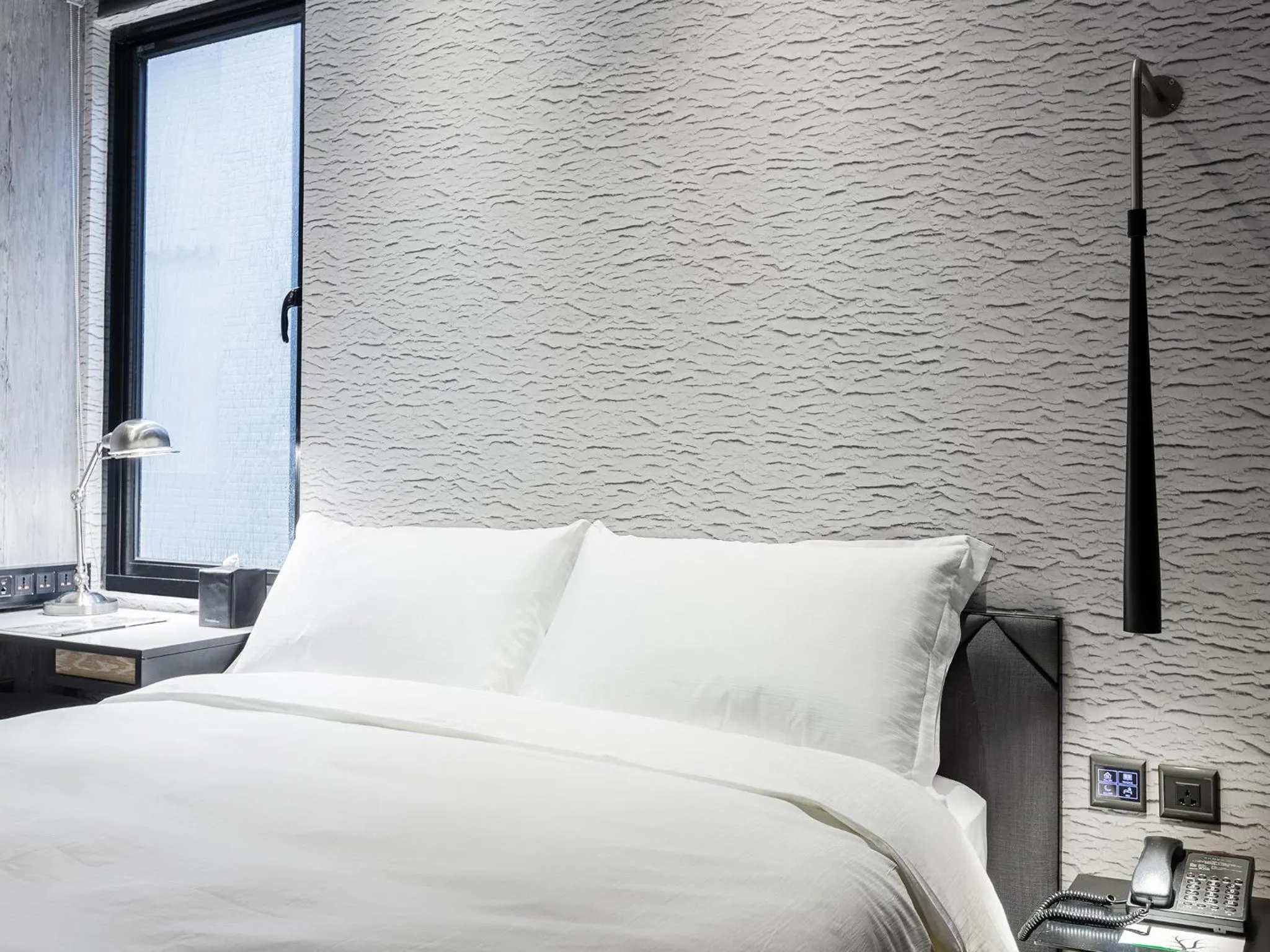 Bed in Tango Inn Taipei Jihe