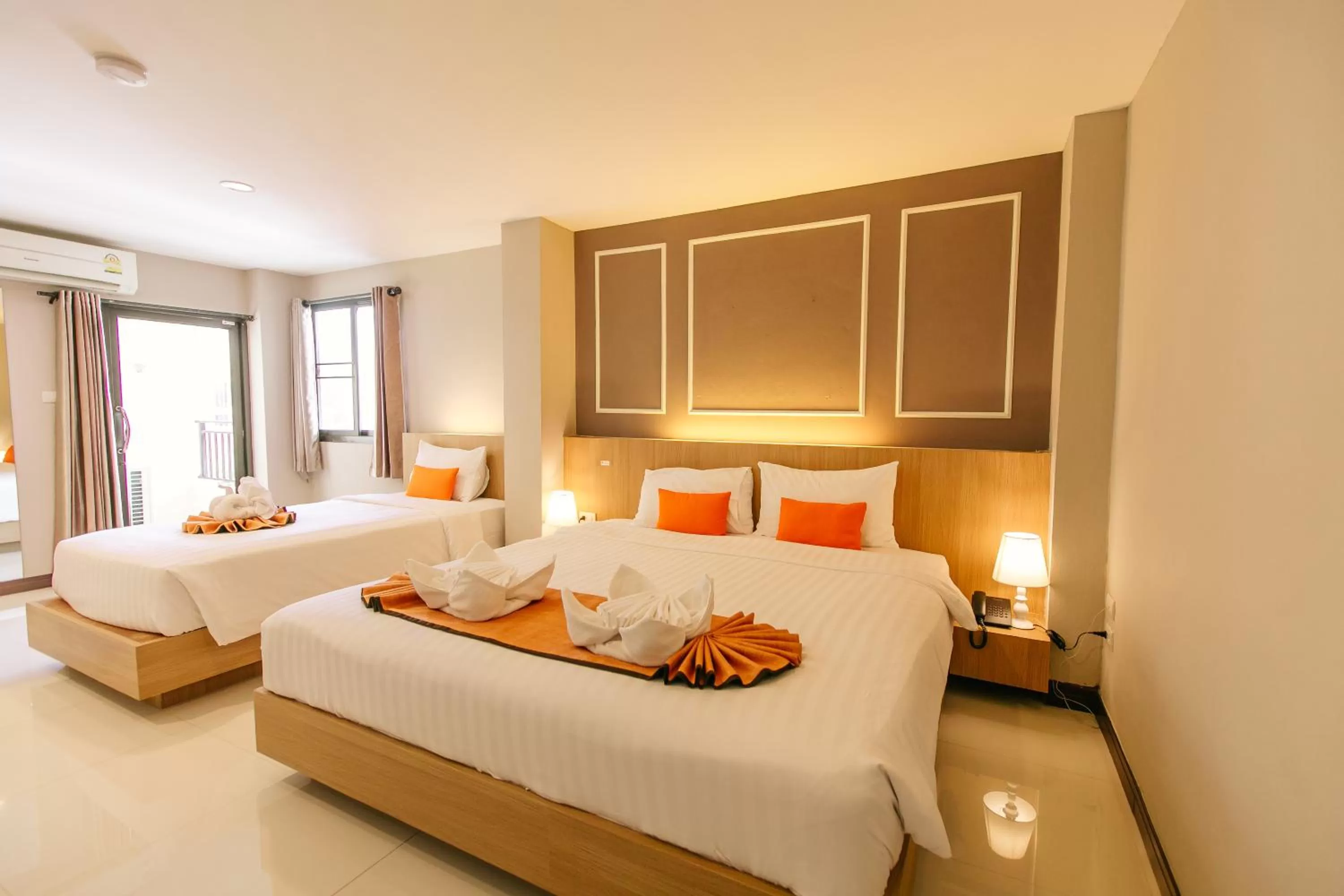Bed in De Hug Hotel & Residence