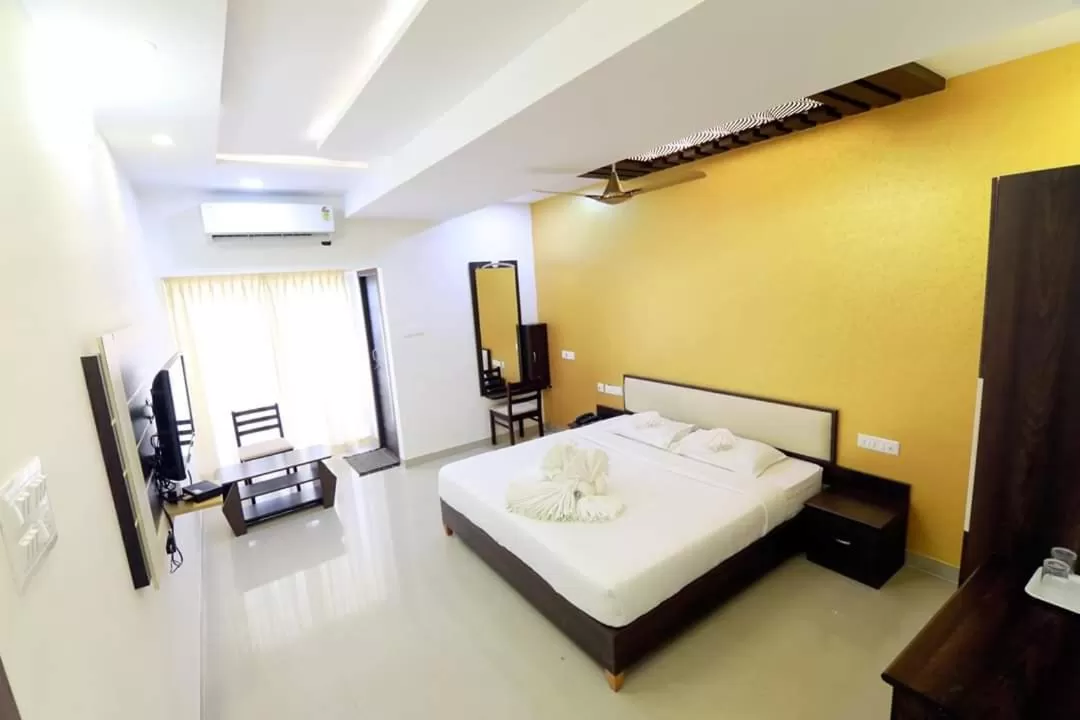 Bed in Hotel Ambai Grand