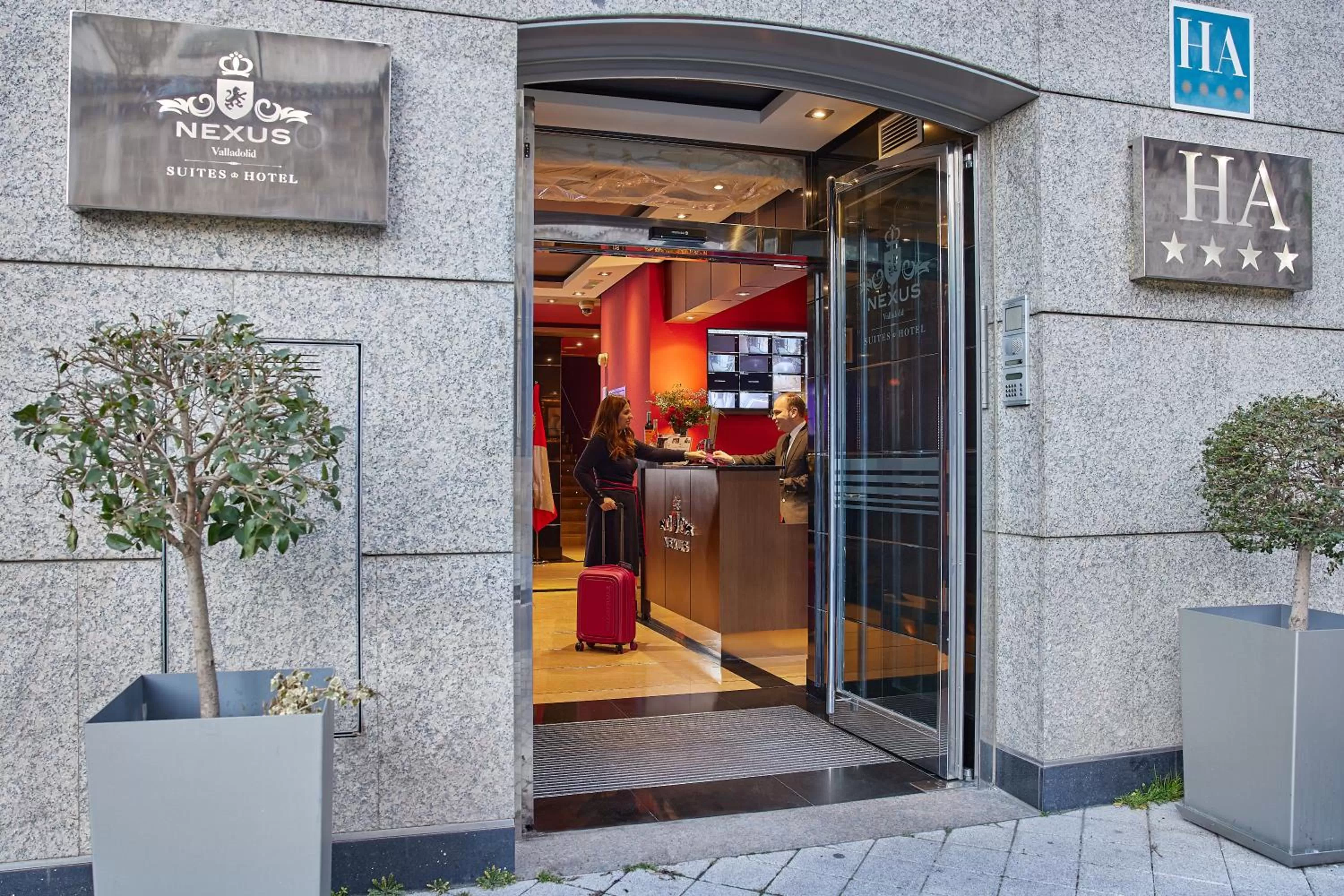 Property logo or sign in Nexus Valladolid Suites & Hotel