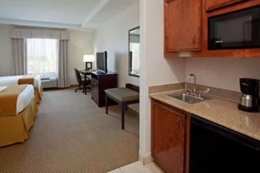 Kitchen or kitchenette, Bed in Holiday Inn Express Texas City, an IHG Hotel