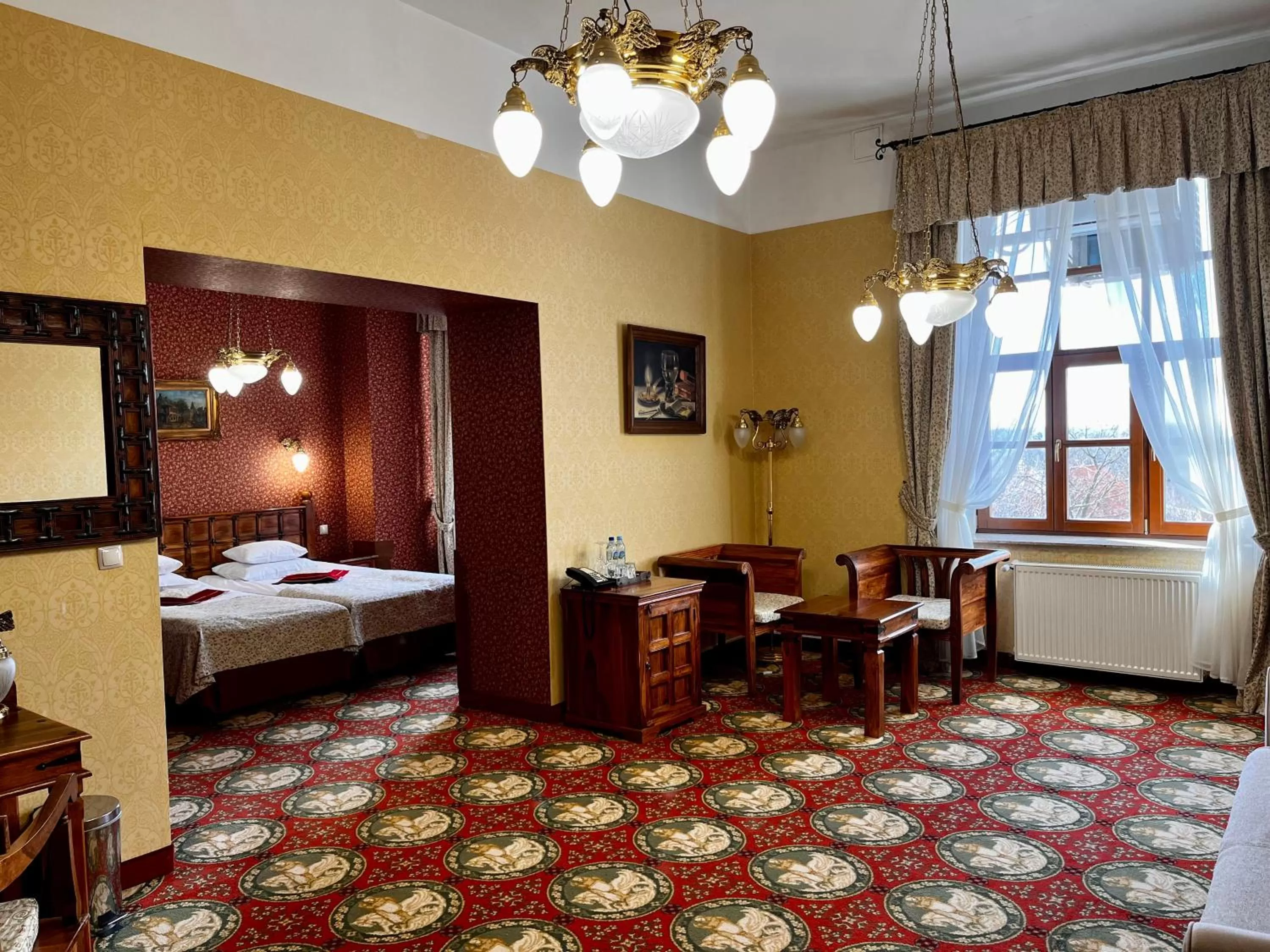 Seating area, Bed in Hotel Zamek Ryn