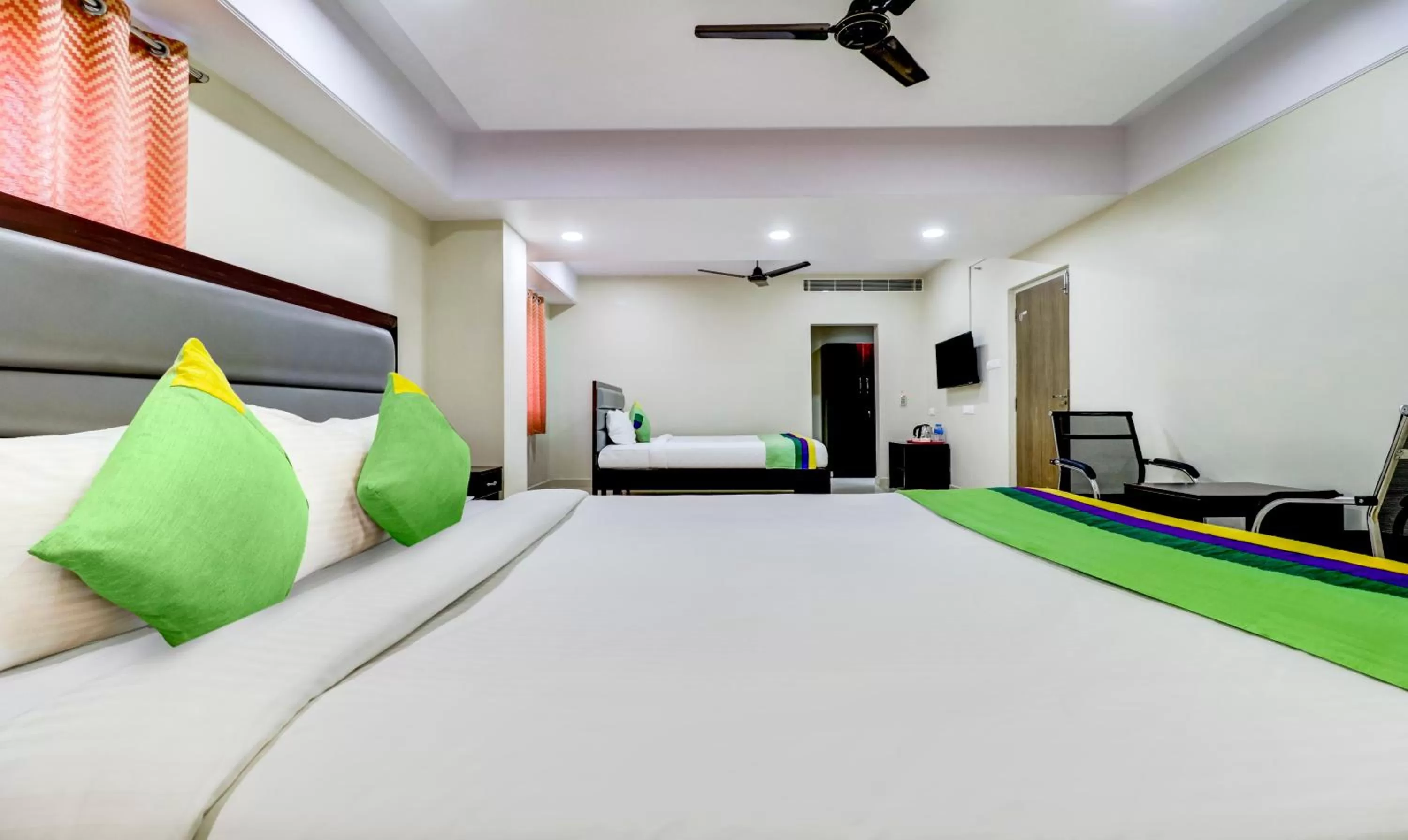 Bedroom, Bed in Treebo Grand Milan