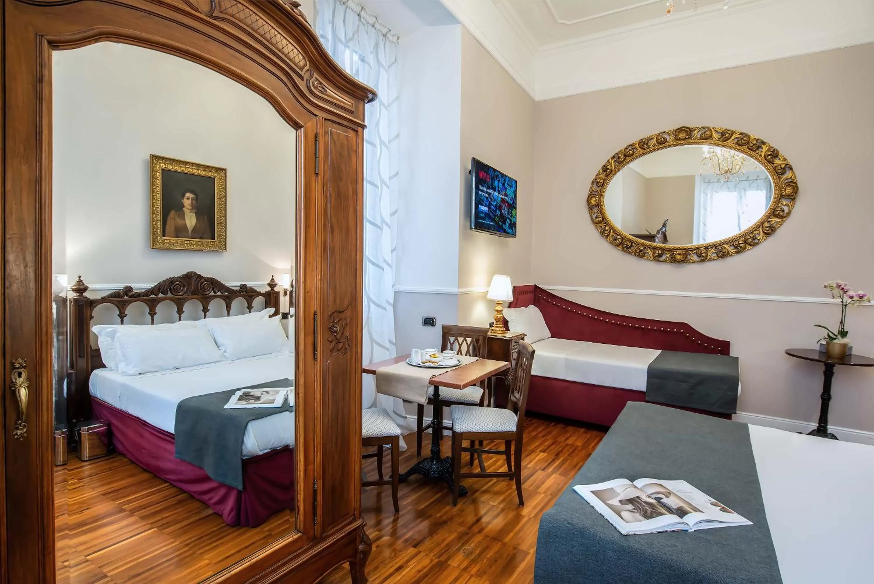 Bed in I TRE MOSCHETTIERI - D'ARTAGNAN Luxury Guest House