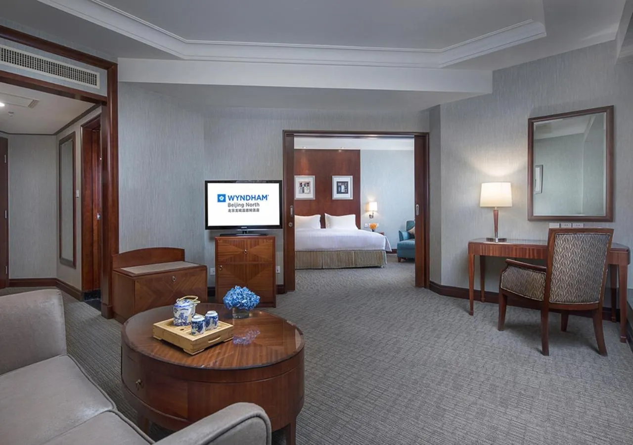 Living room, Bed in Wyndham Beijing North