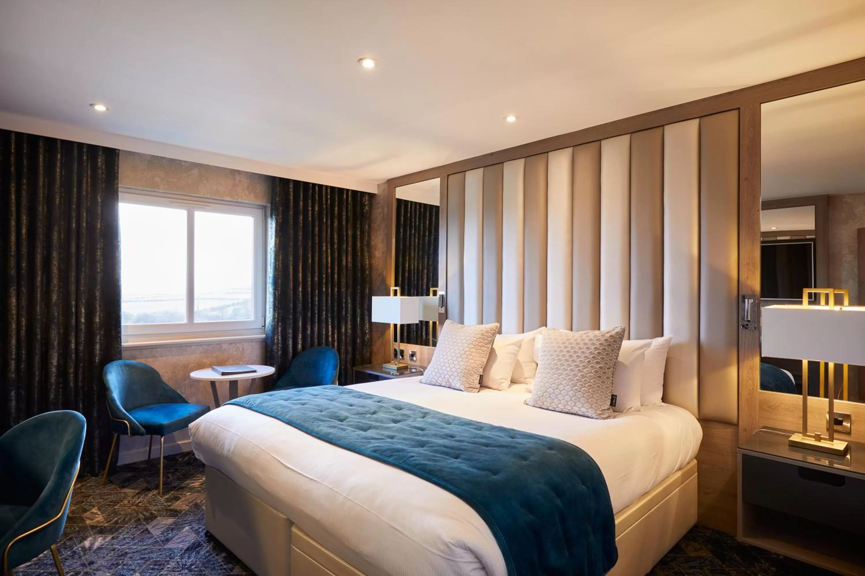 Bed in Radstone Hotel