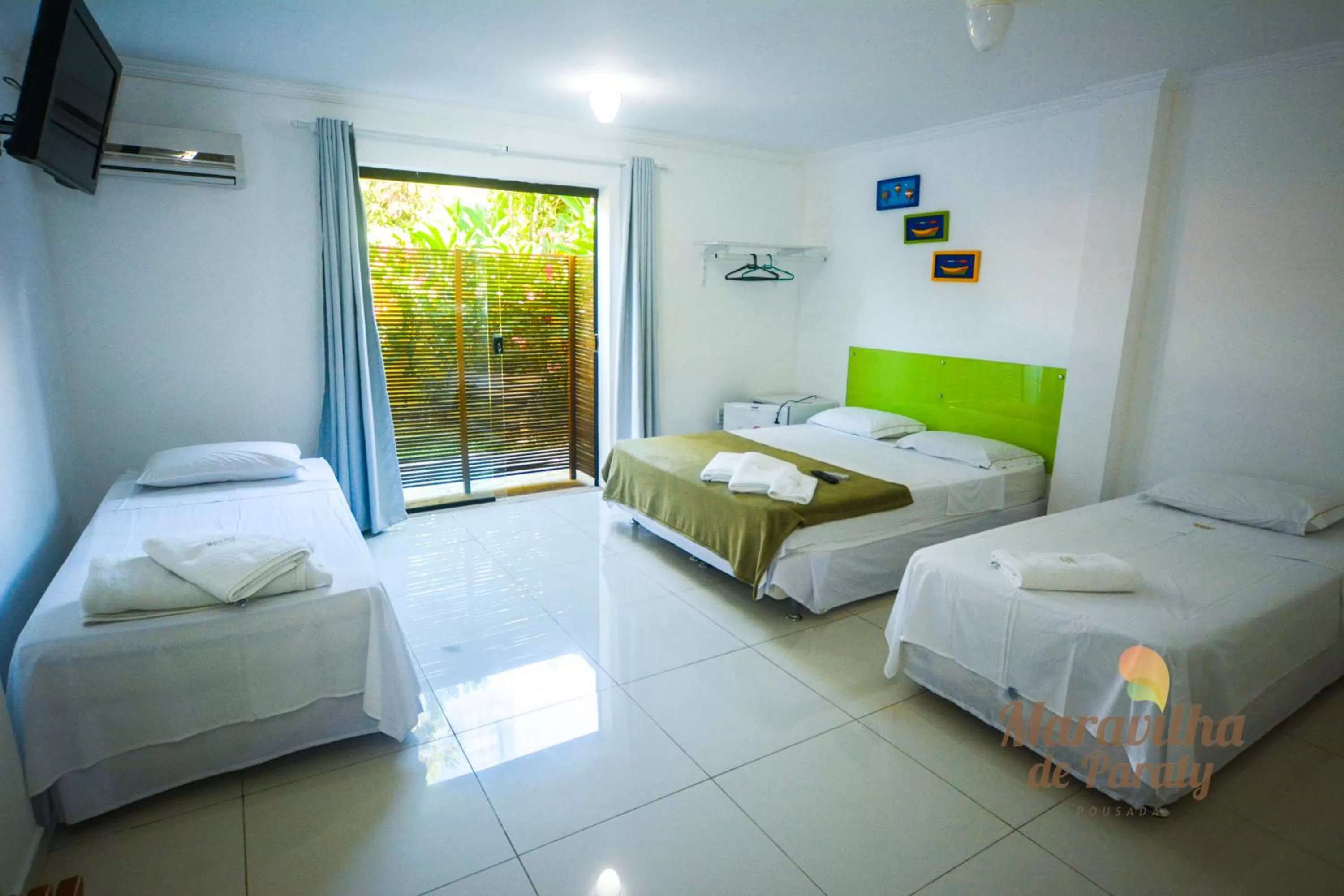 Photo of the whole room, Bed in Pousada Maravilha de Paraty